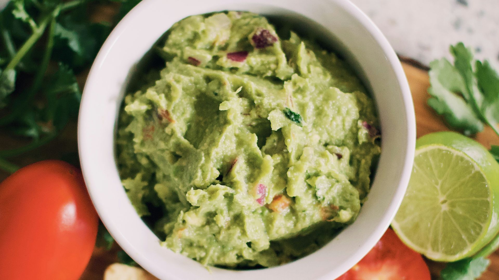 green soup in white ceramic bowl