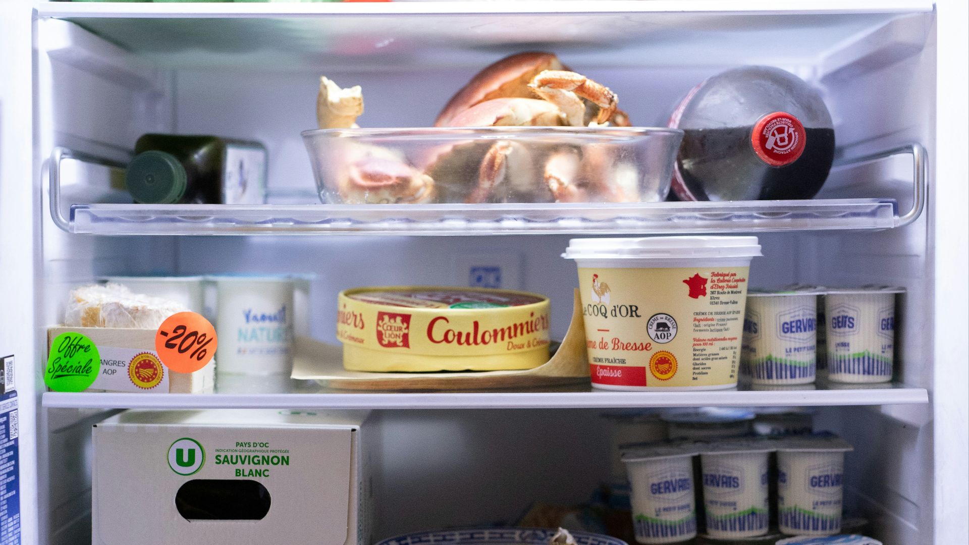 an open refrigerator filled with lots of food