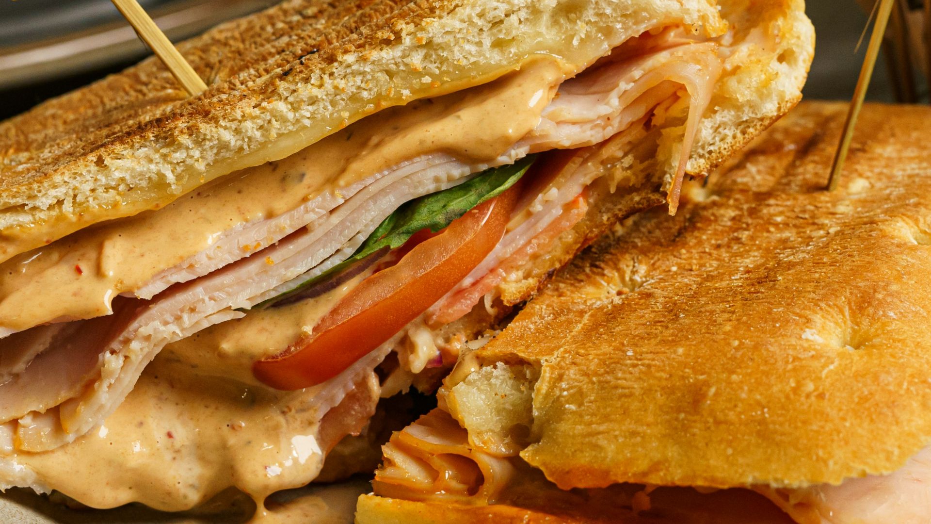 a sandwich cut in half on a plate