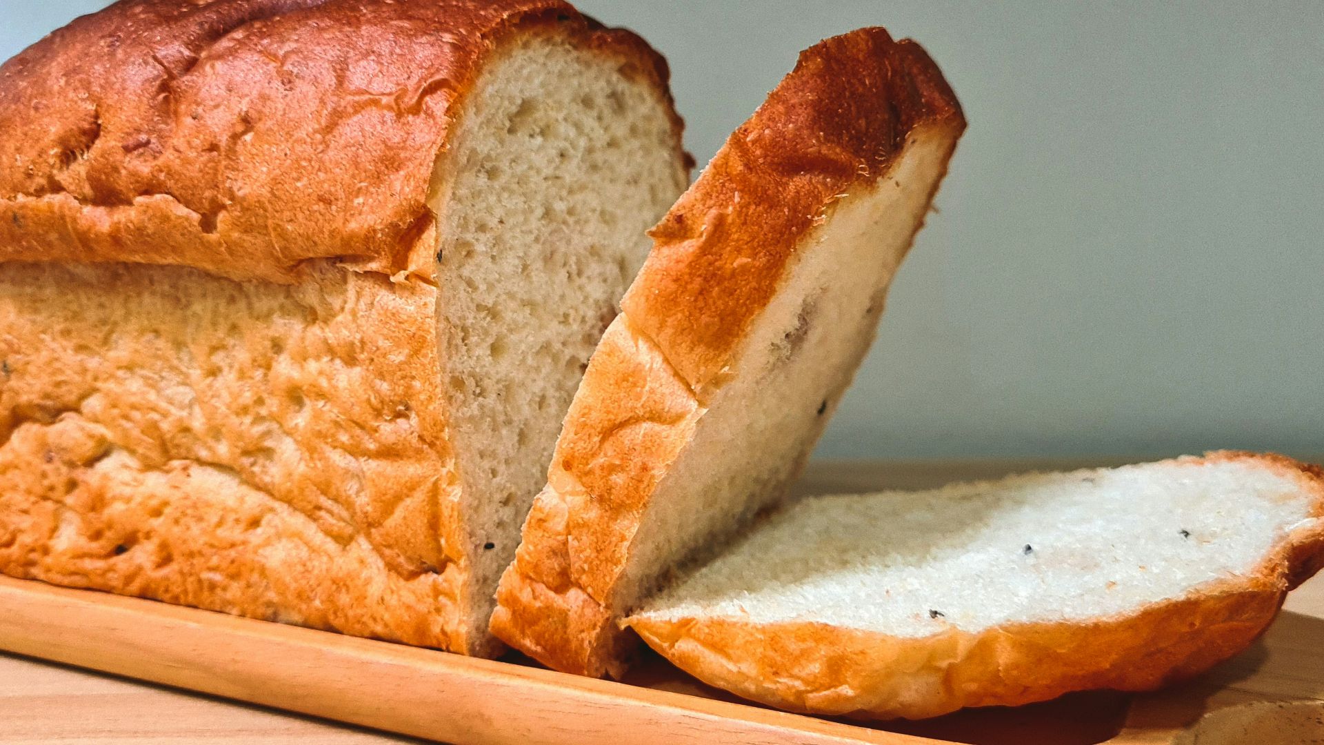 a loaf of bread with a slice cut out