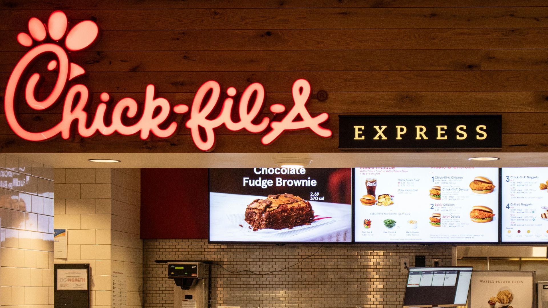 a fast food restaurant with a large menu