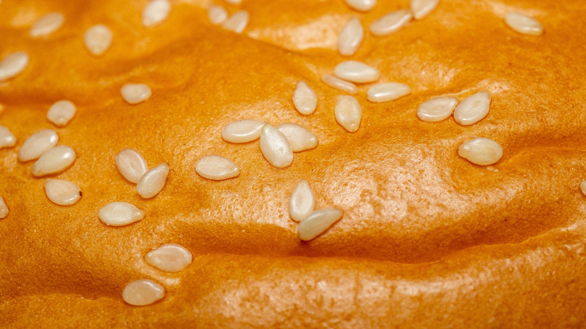 a loaf of bread with seeds on top of it