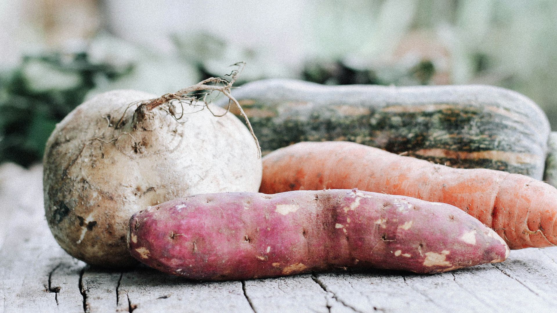 orange carrots on brown wooden table