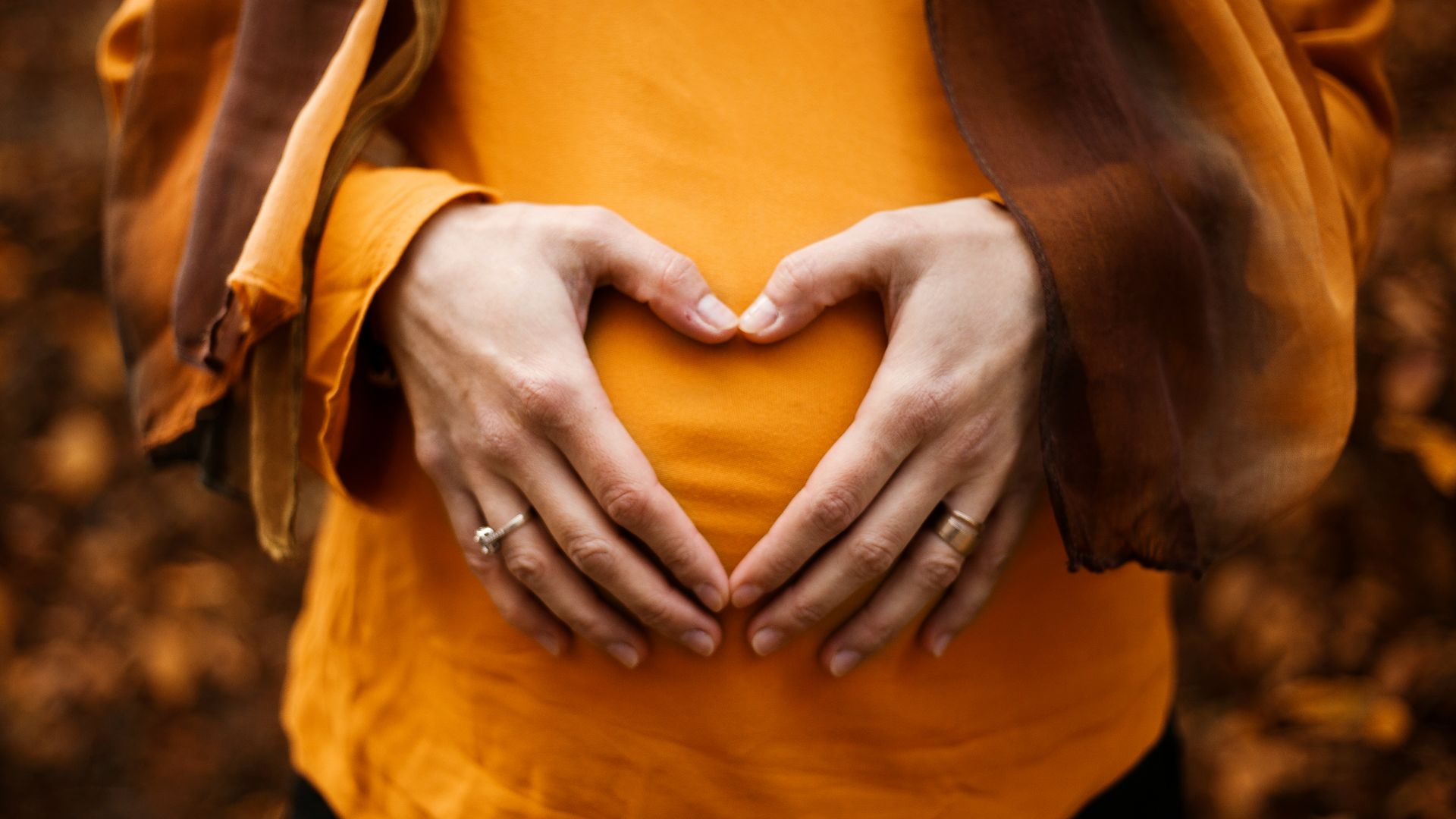 person touching stomach