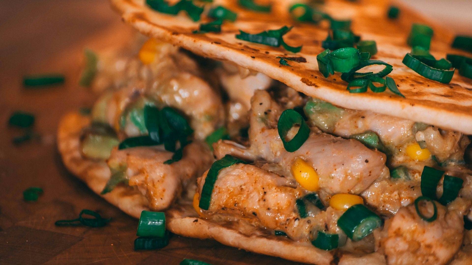 wrapped food on wooden surface