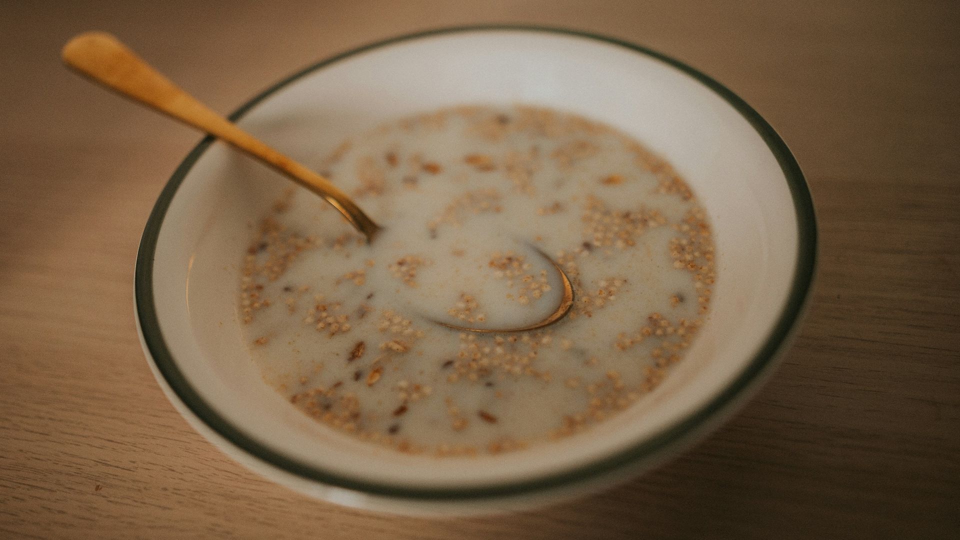 a bowl of cereal with a spoon in it