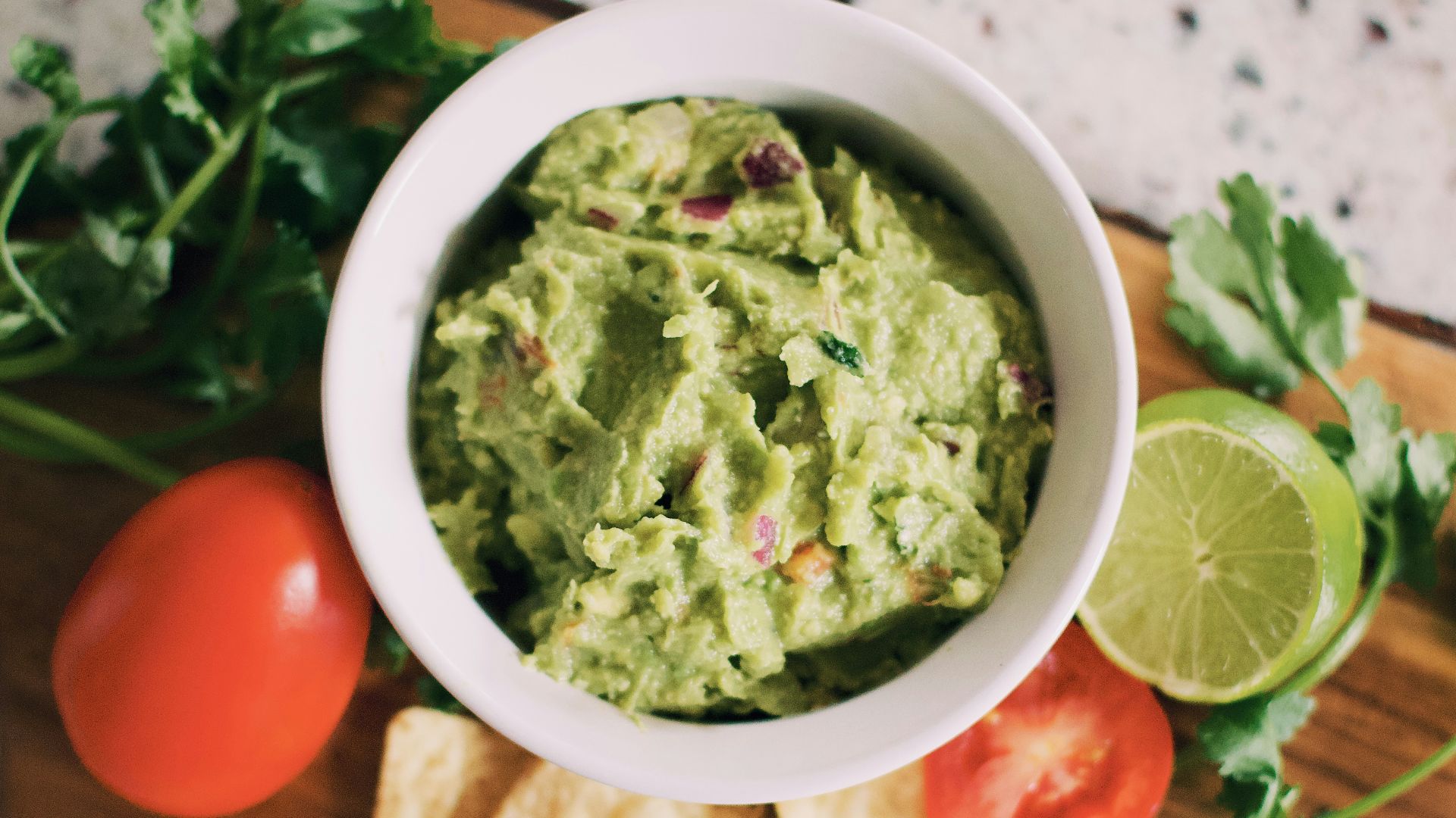 green soup in white ceramic bowl