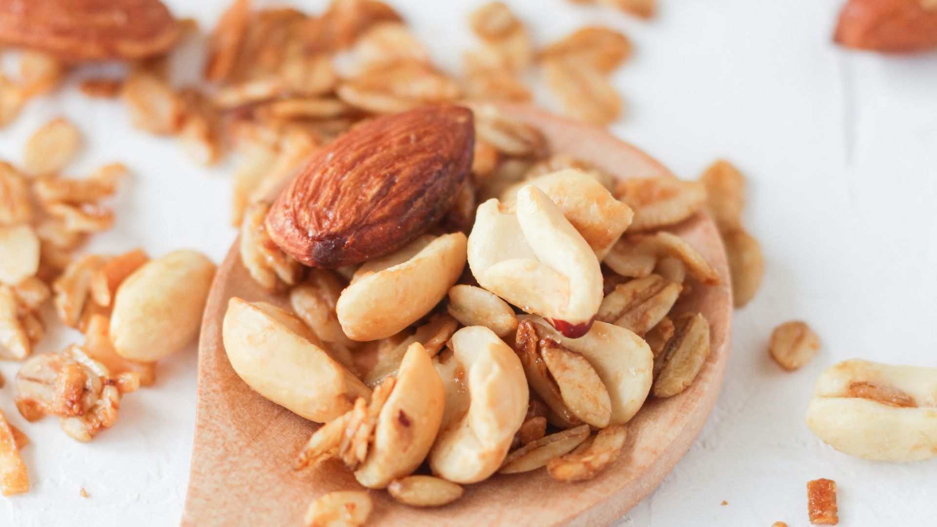 brown wooden spoon with brown and white food