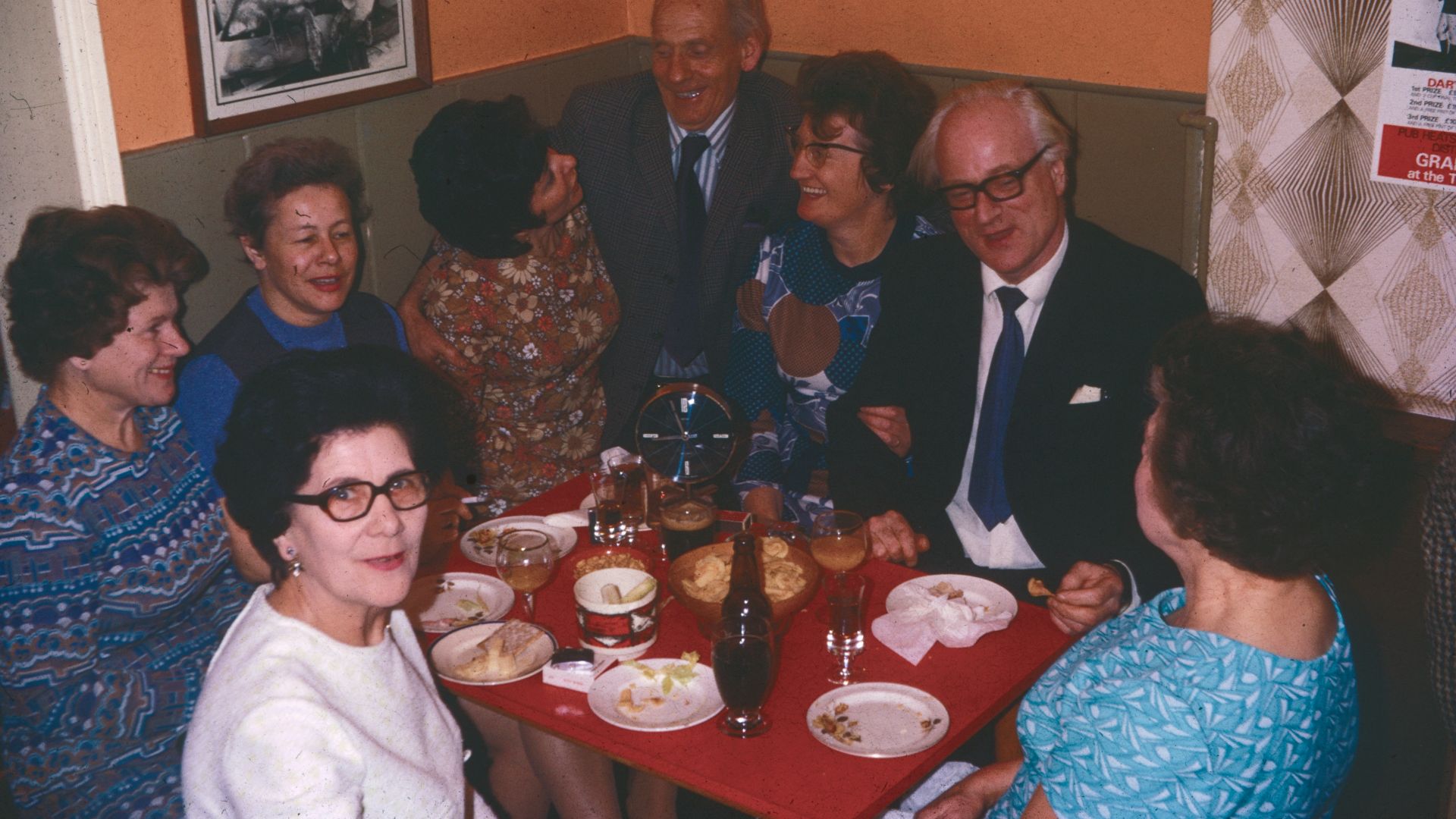 Group of people gathered around a table