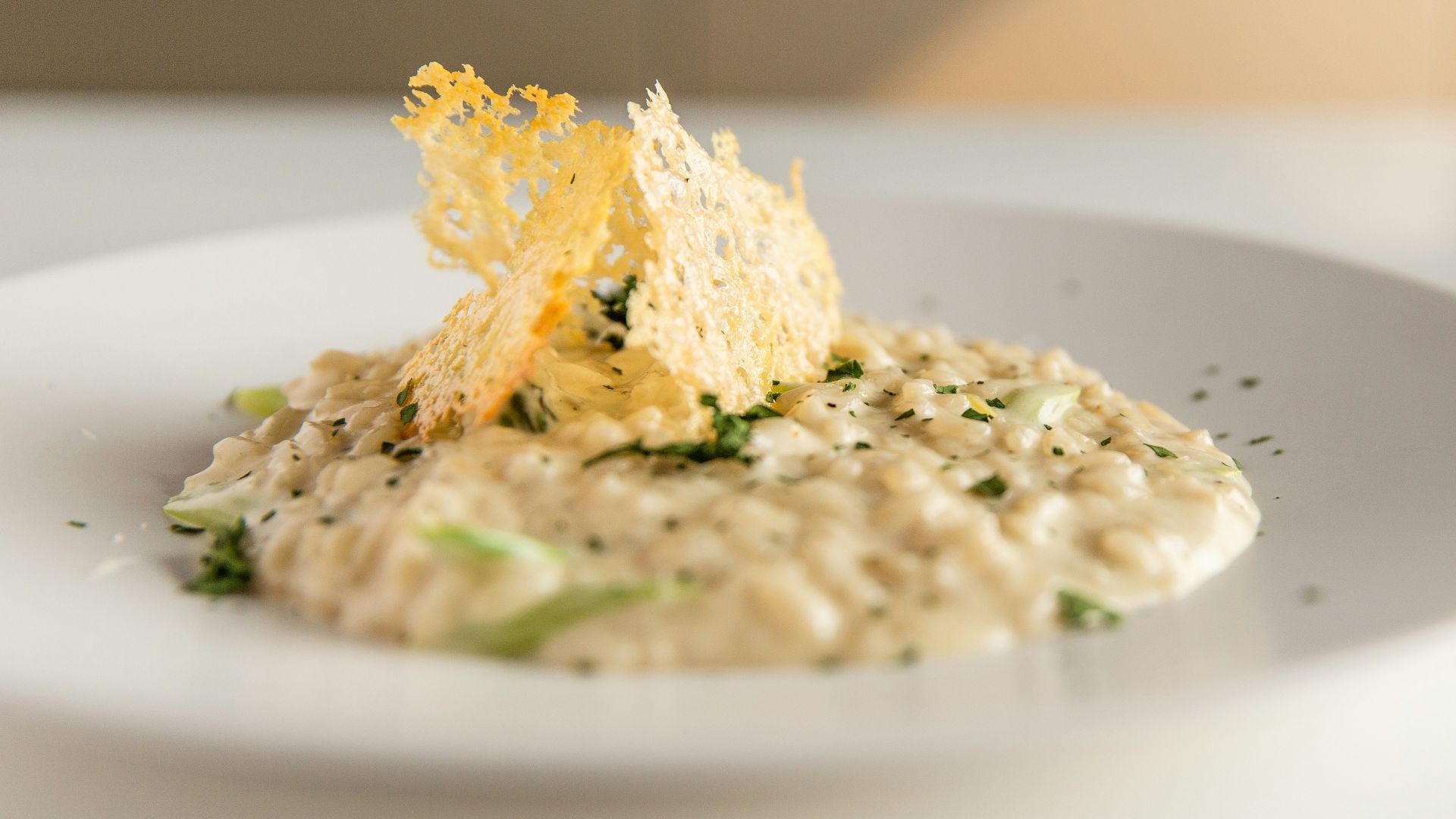 a white plate topped with food on top of a table