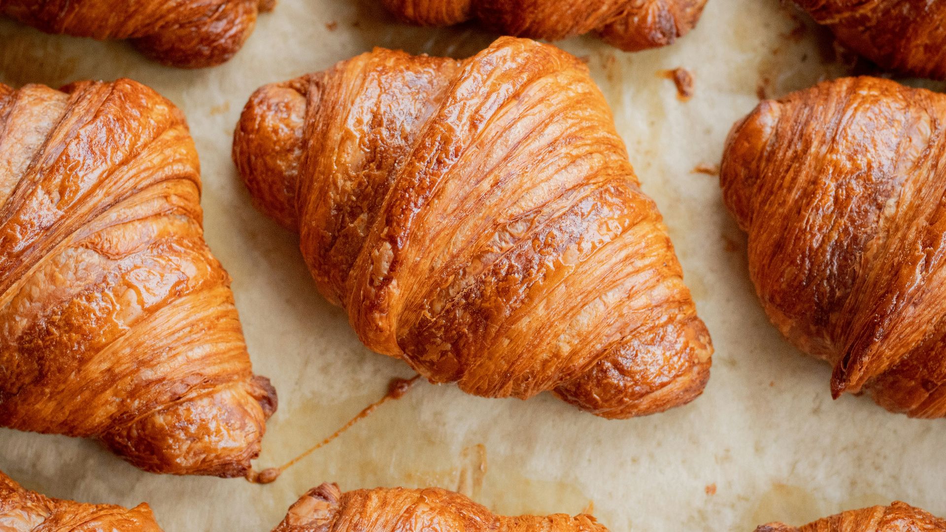 a bunch of croissants that are on a table