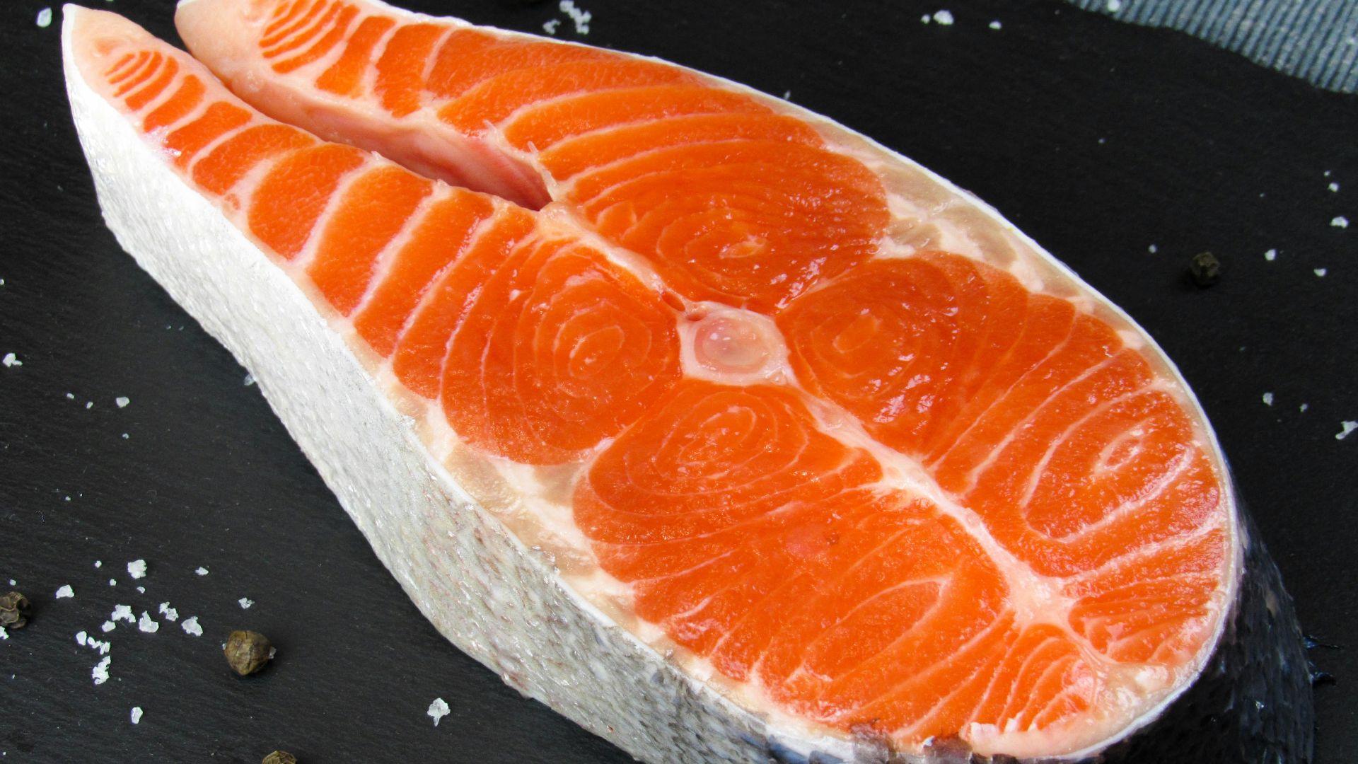 a close up of a piece of fish on a table