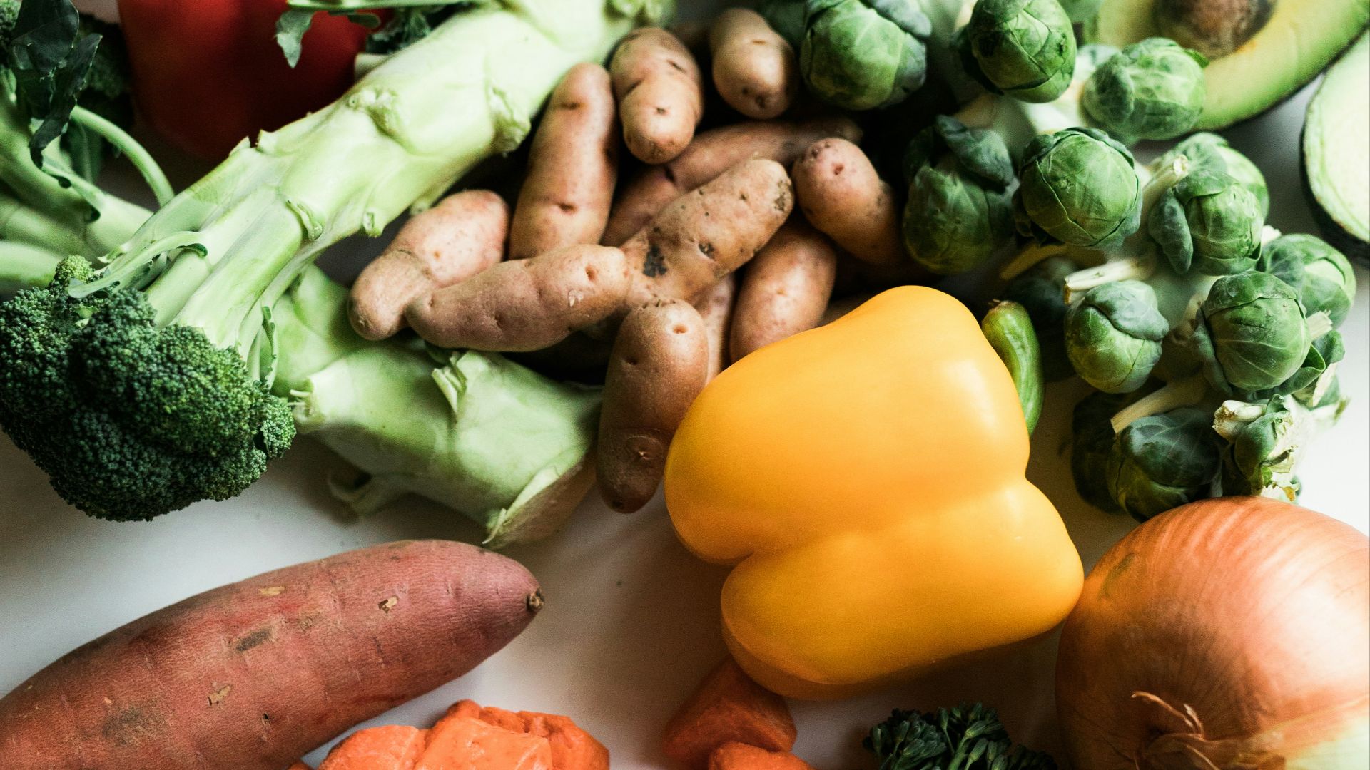sliced carrots and green vegetable