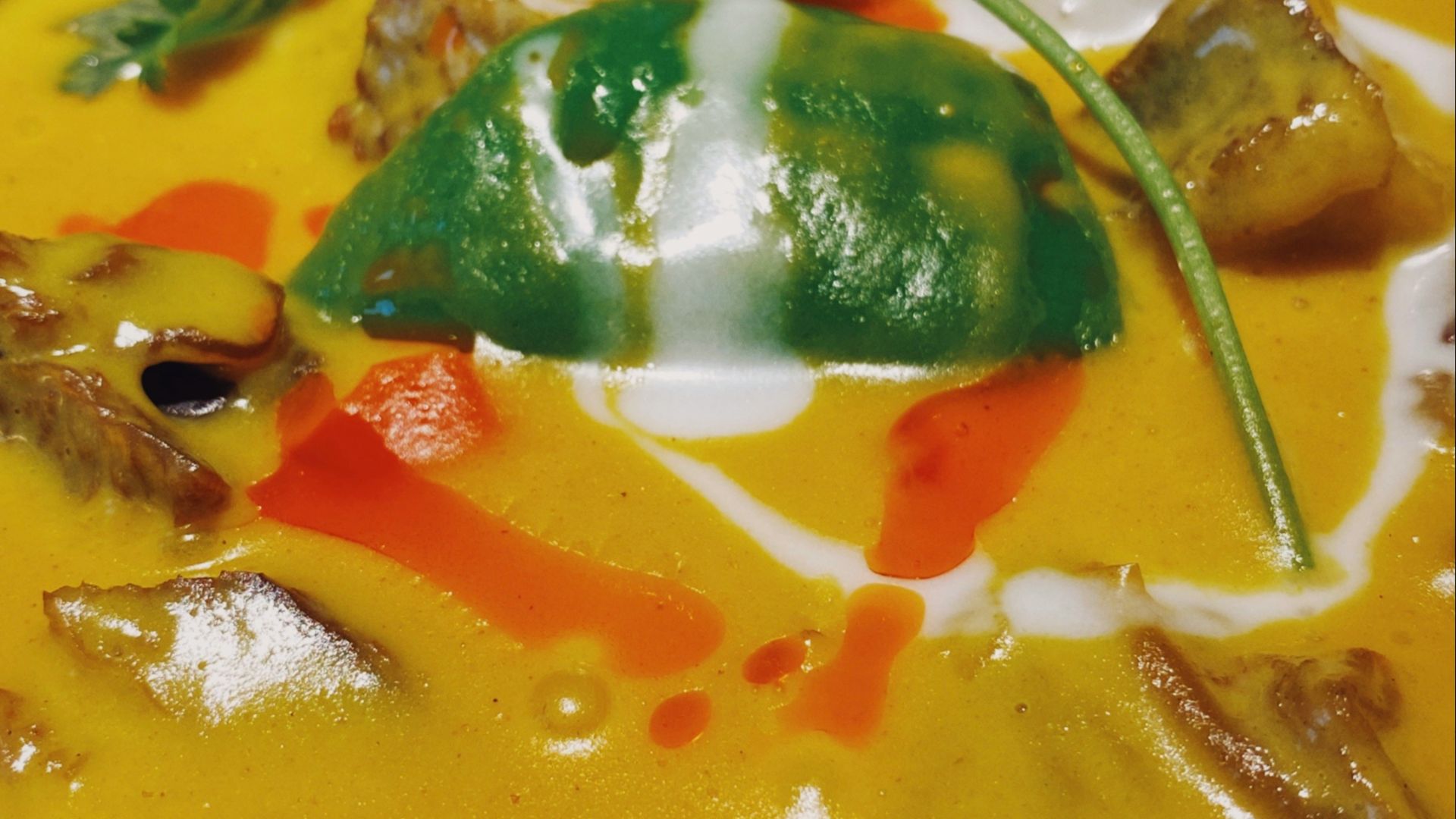 soup with vegetables on stainless steel bowl