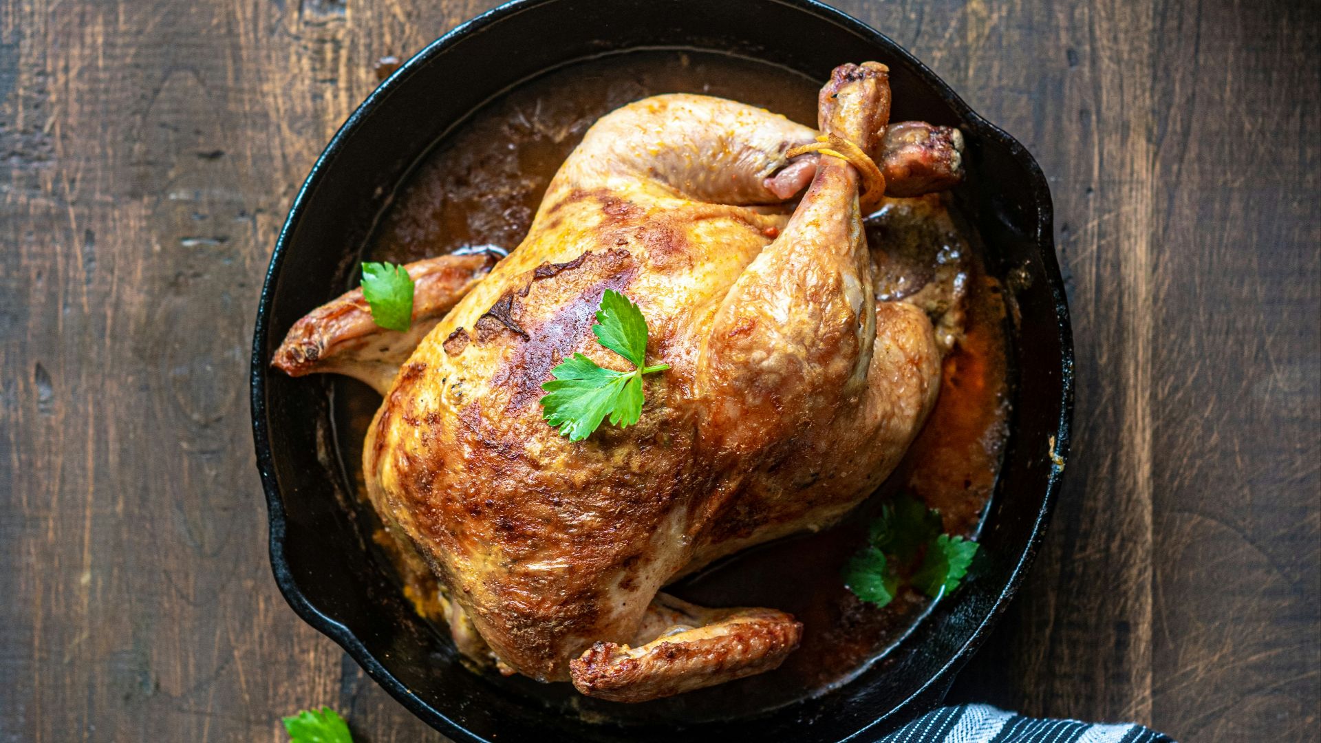 chicken on black round plate