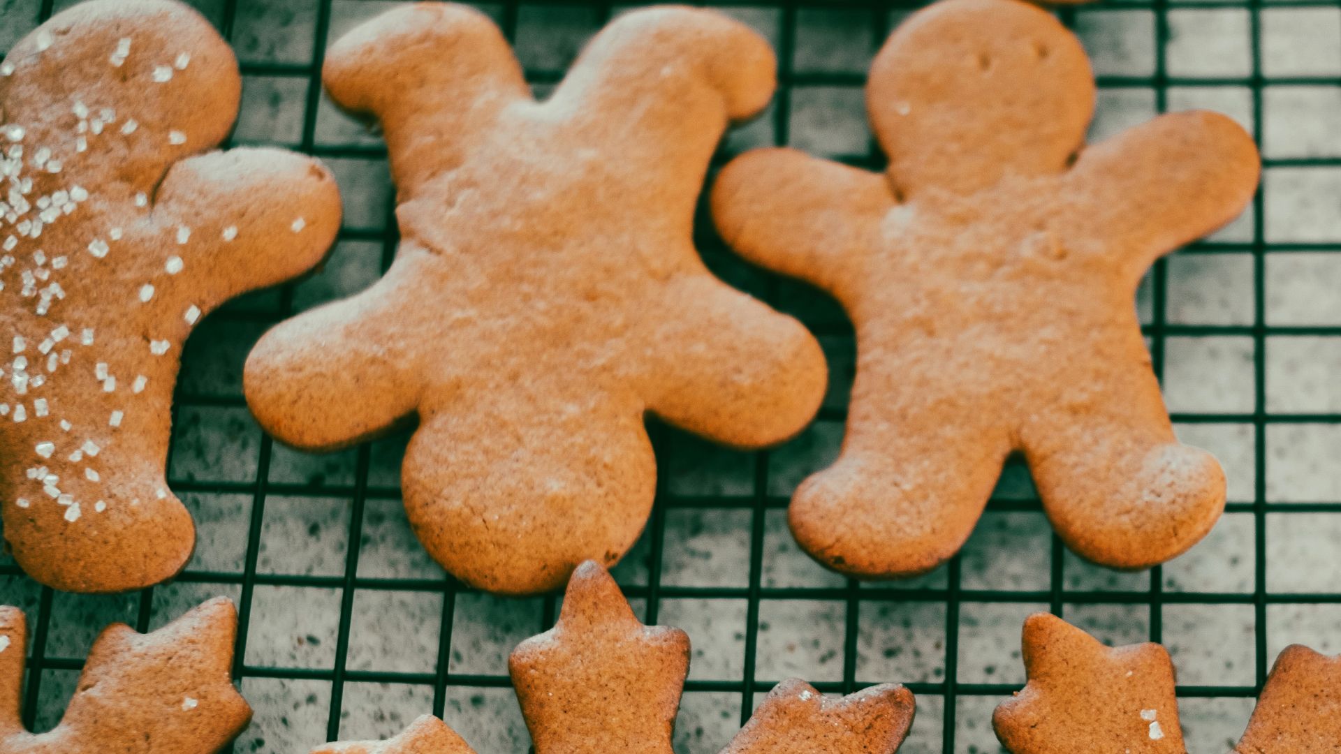 a close up of some cookies on a cooling rack