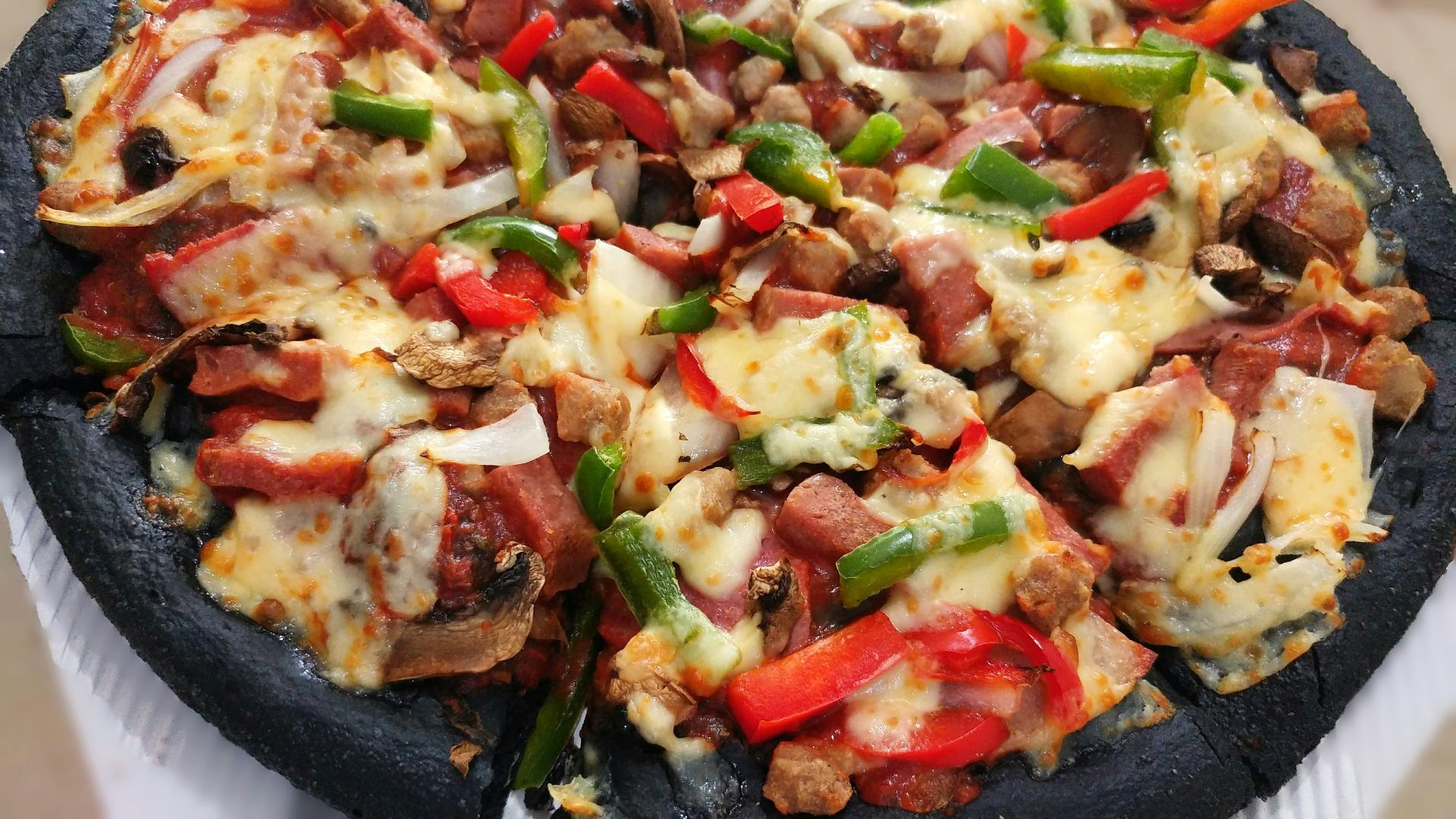 a close up of a pizza on a plate