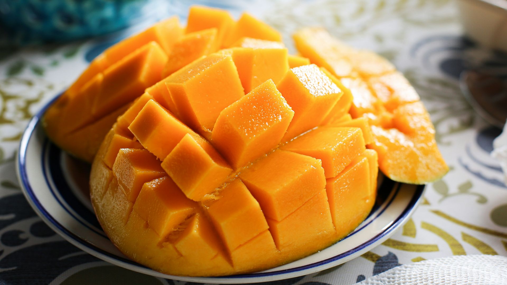 a close up of a plate of fruit on a table