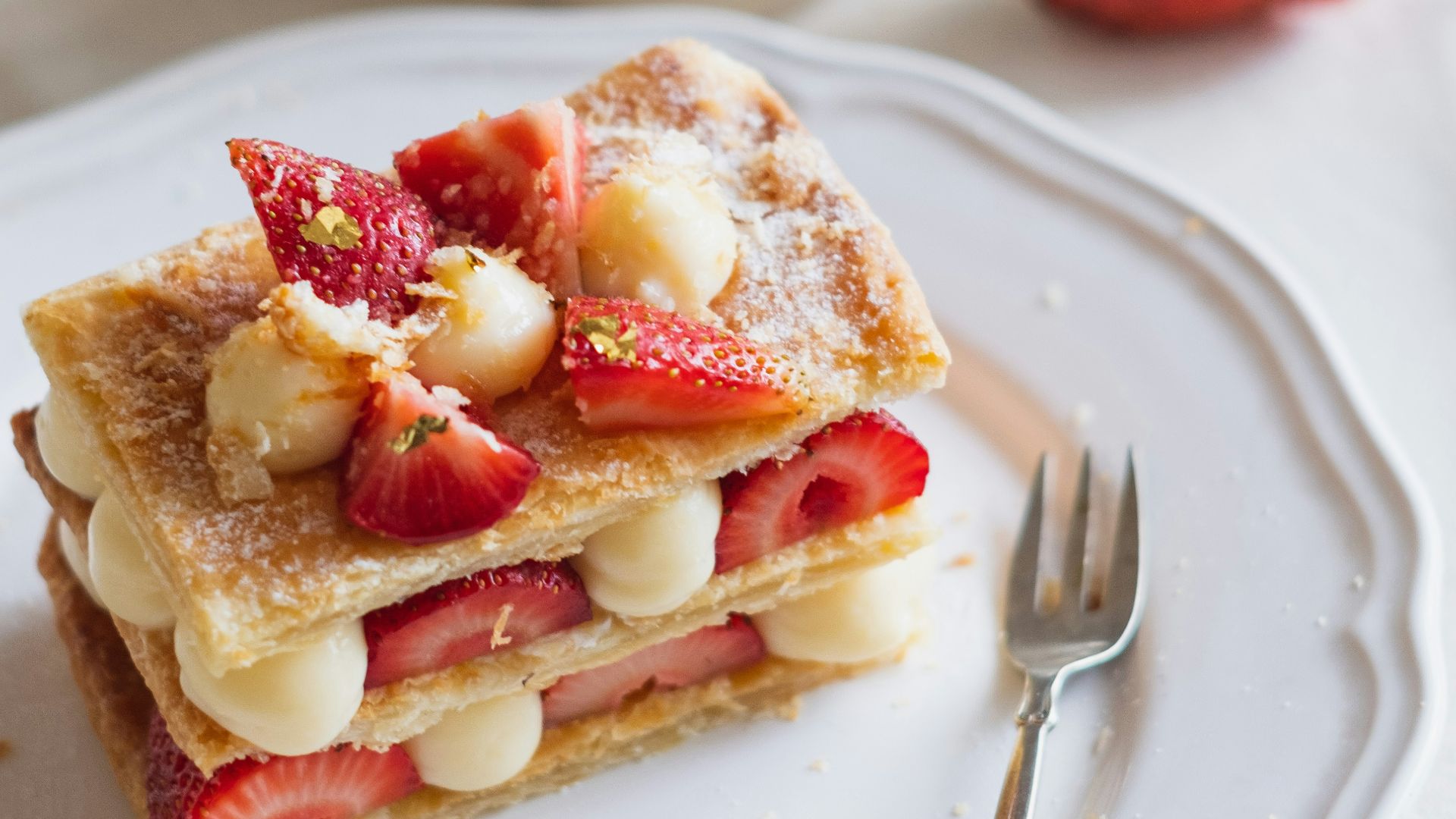 strawberry and banana on white ceramic plate