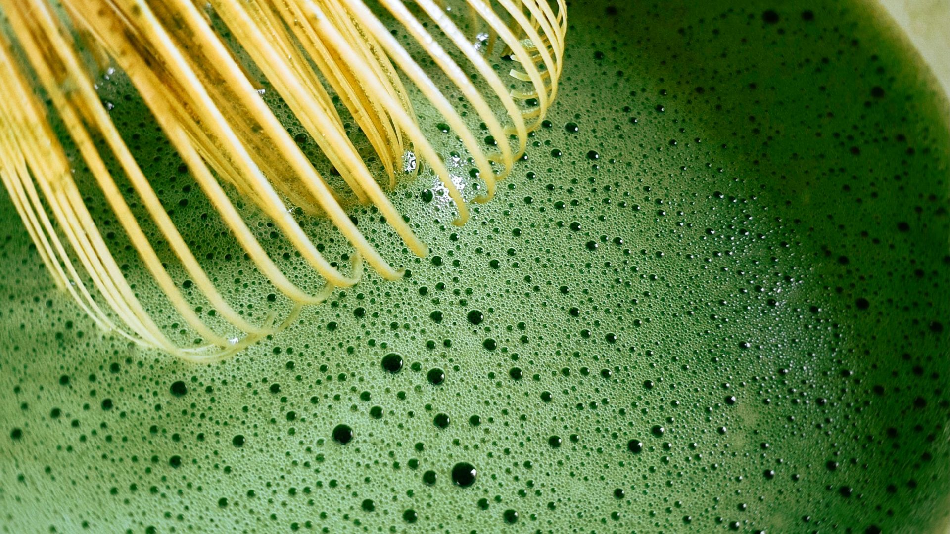 white coated wire on black surface