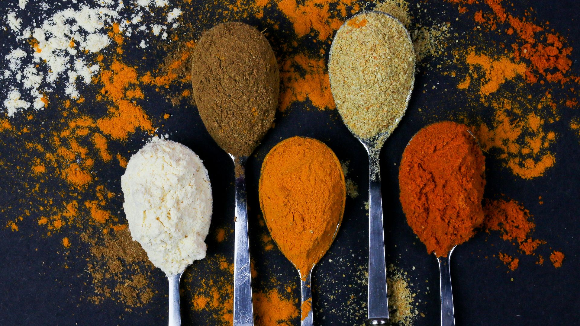 brown powder on silver spoon