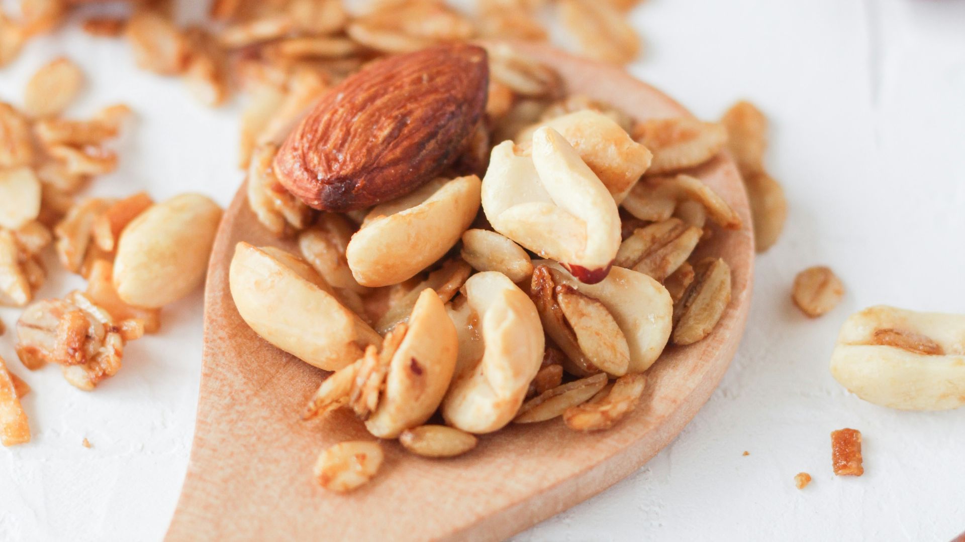 brown wooden spoon with brown and white food