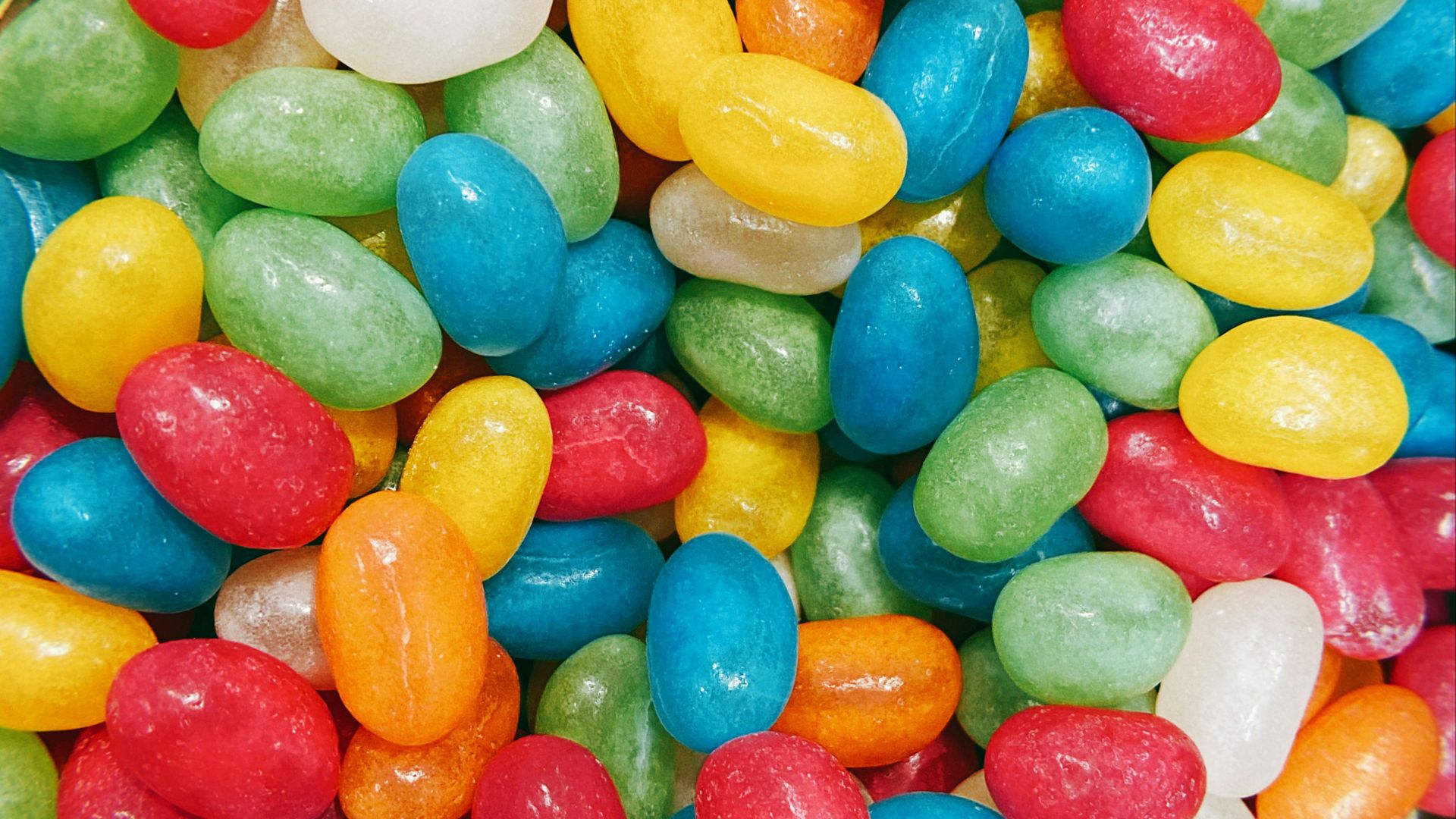 blue yellow and red m ms chocolate candies