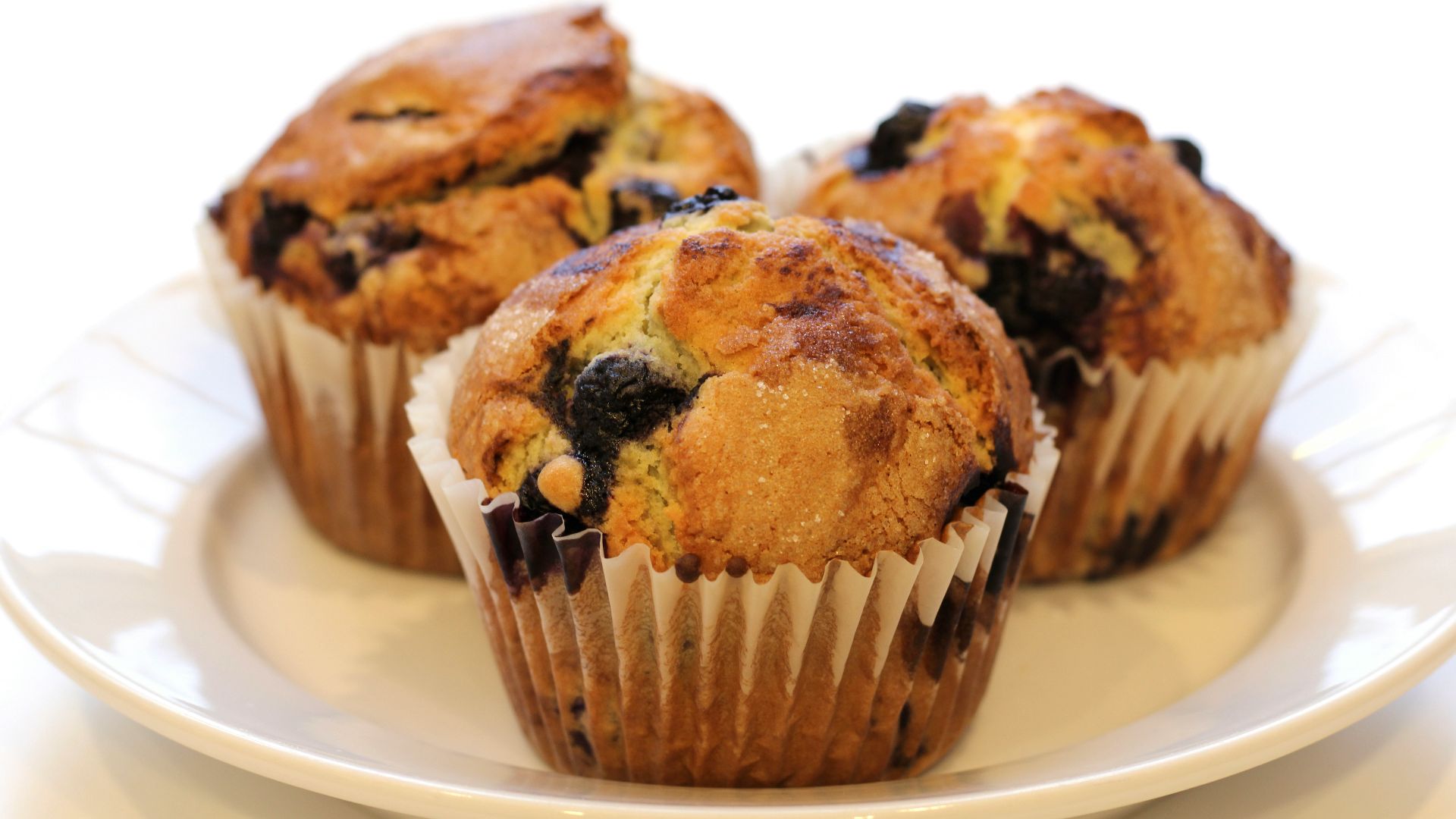 brown cupcakes on white ceramic plate
