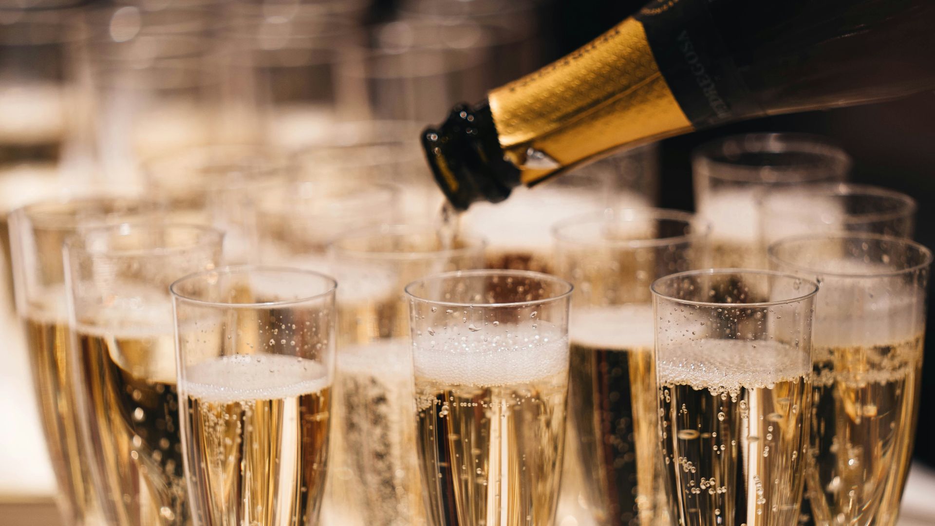 clear drinking glass with brown liquid