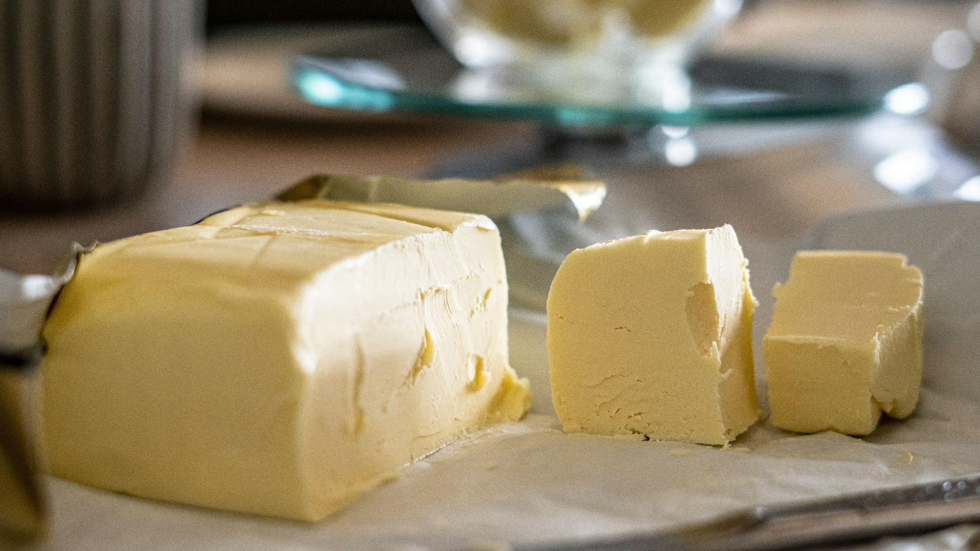 sliced cheese on clear glass plate
