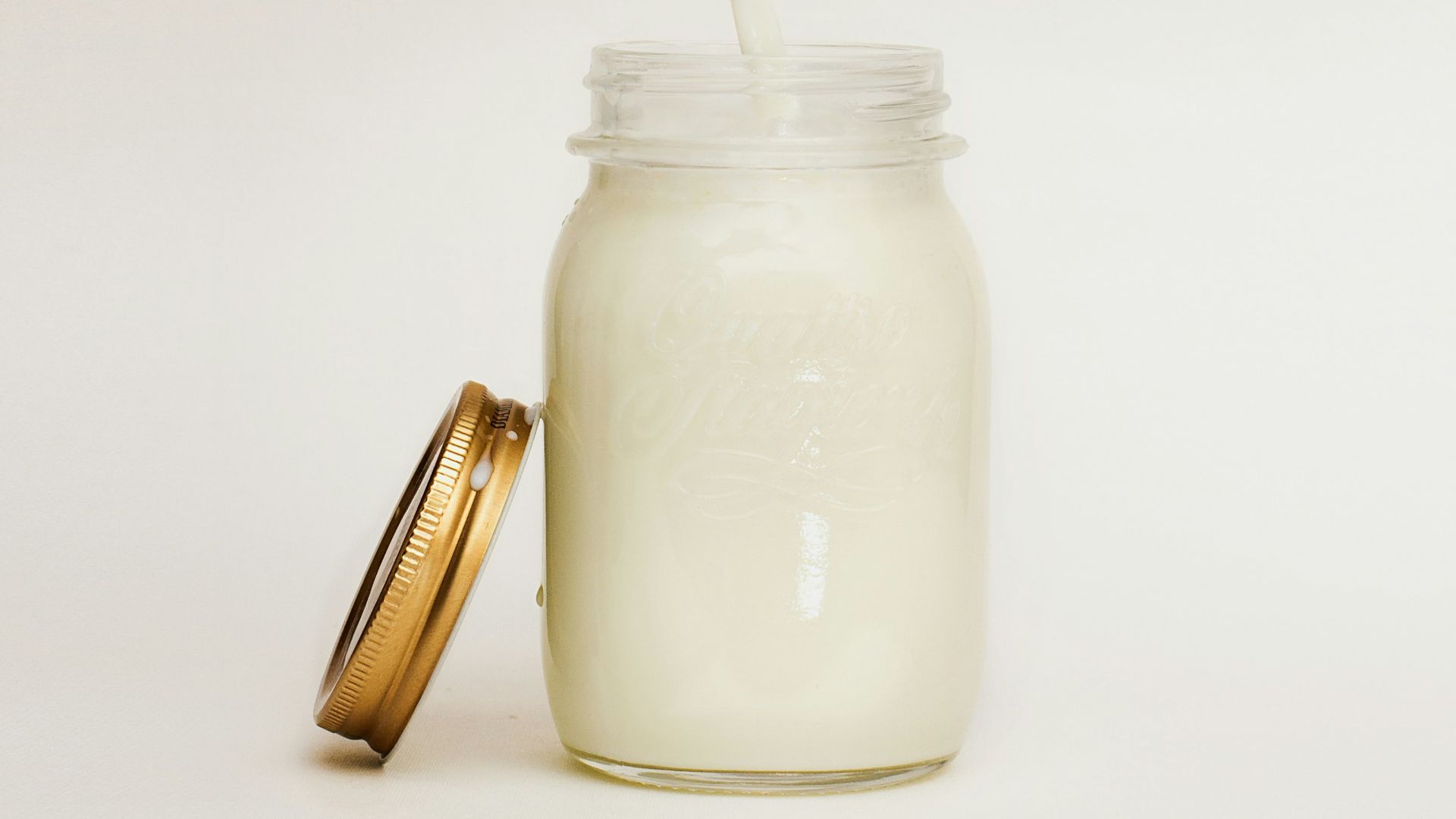 mason jar filled with smoothie