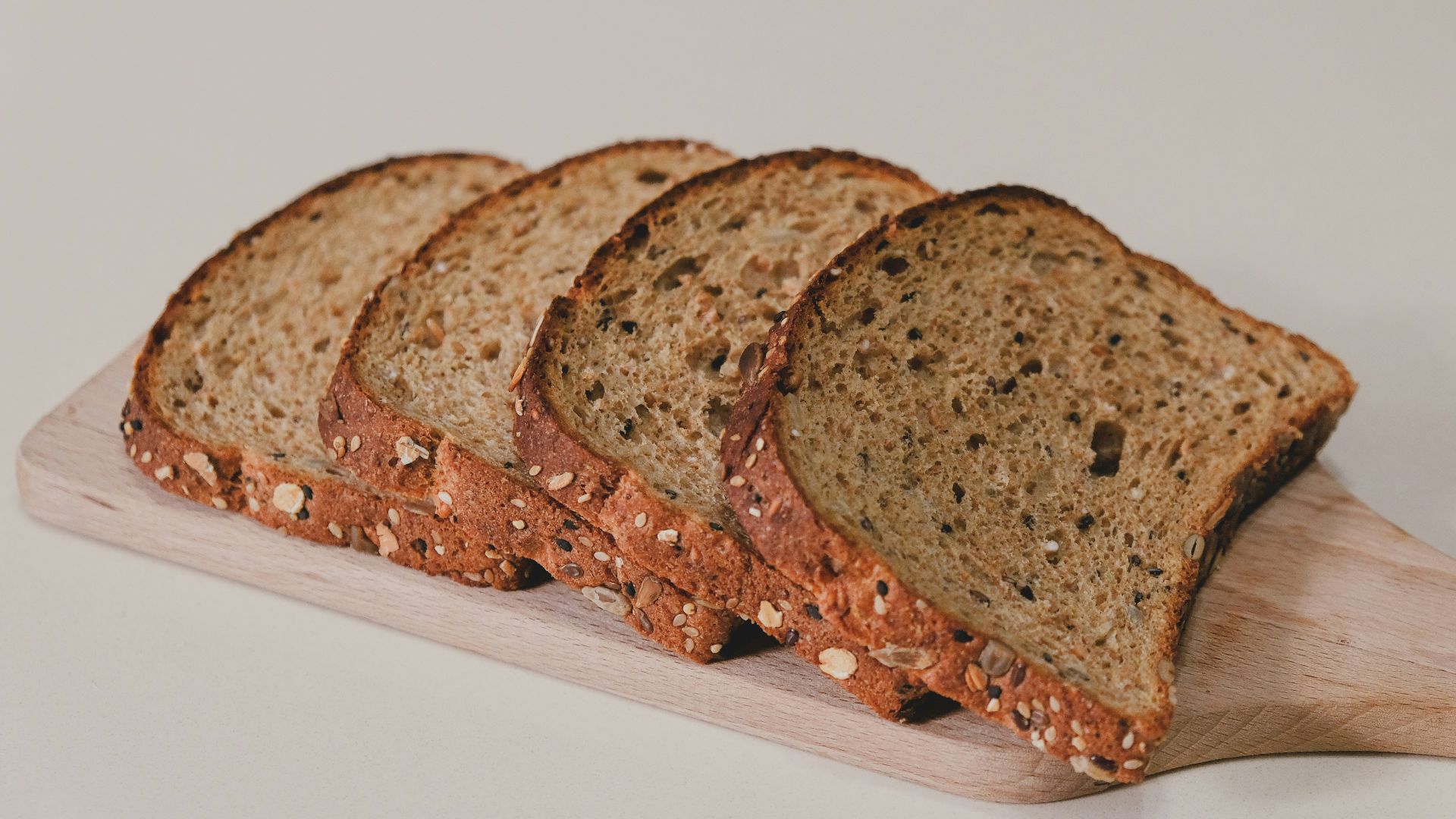 sliced bread on white table