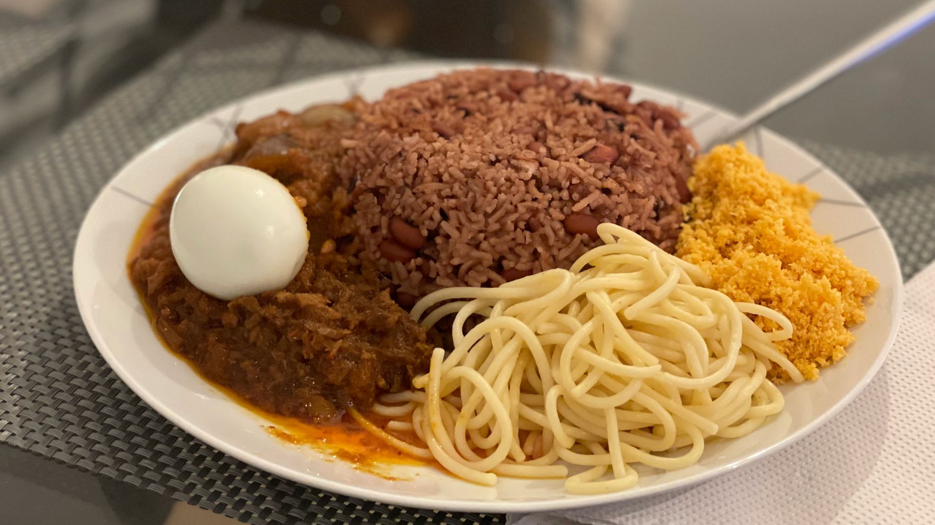 pasta with meat on white ceramic plate