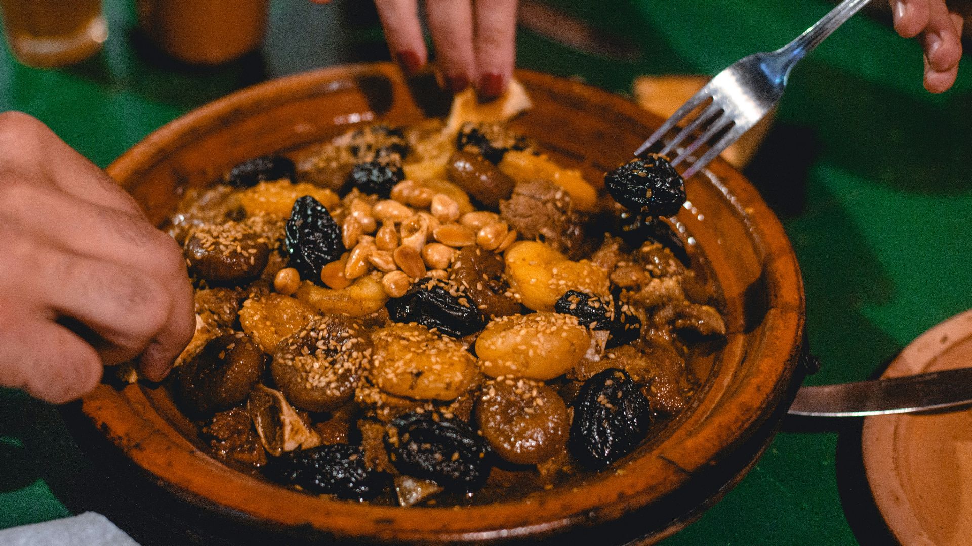 a person eating a bowl of food