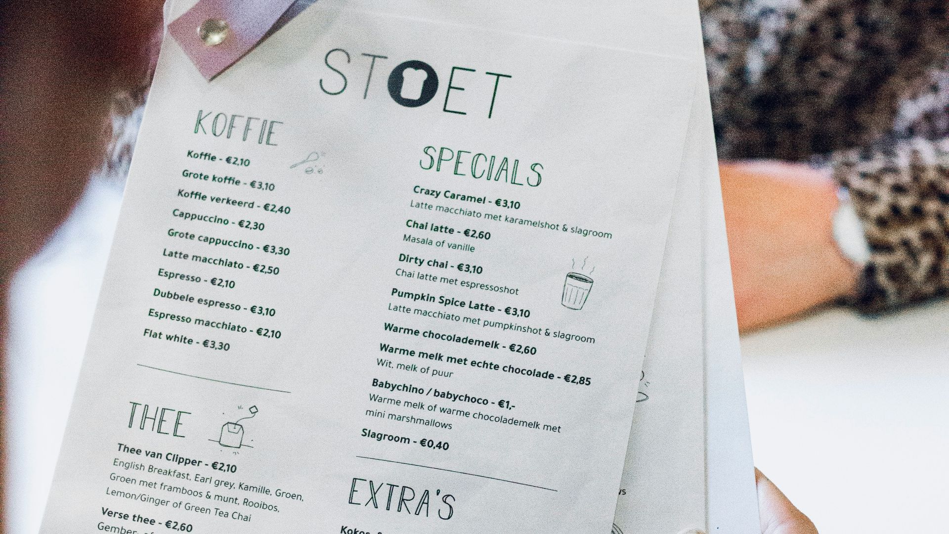 person holding white printer paper