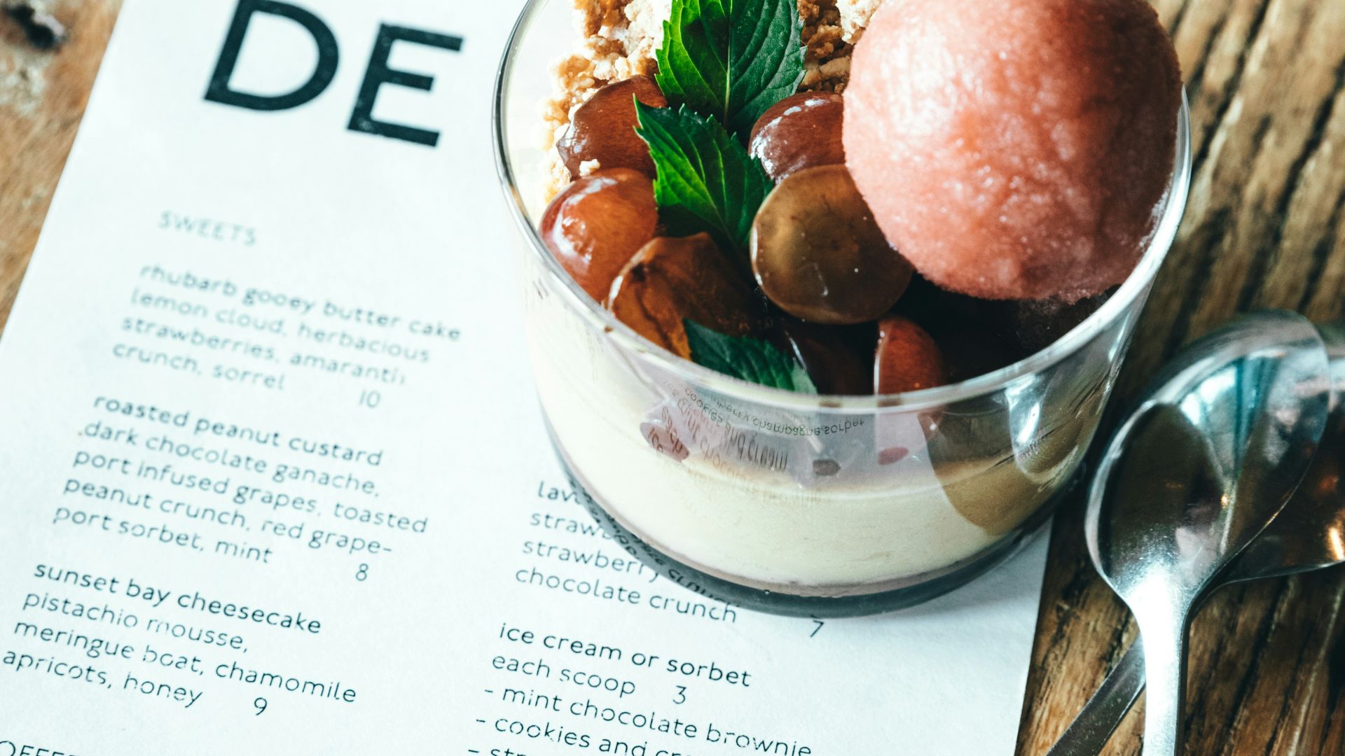 glass of dessert on table