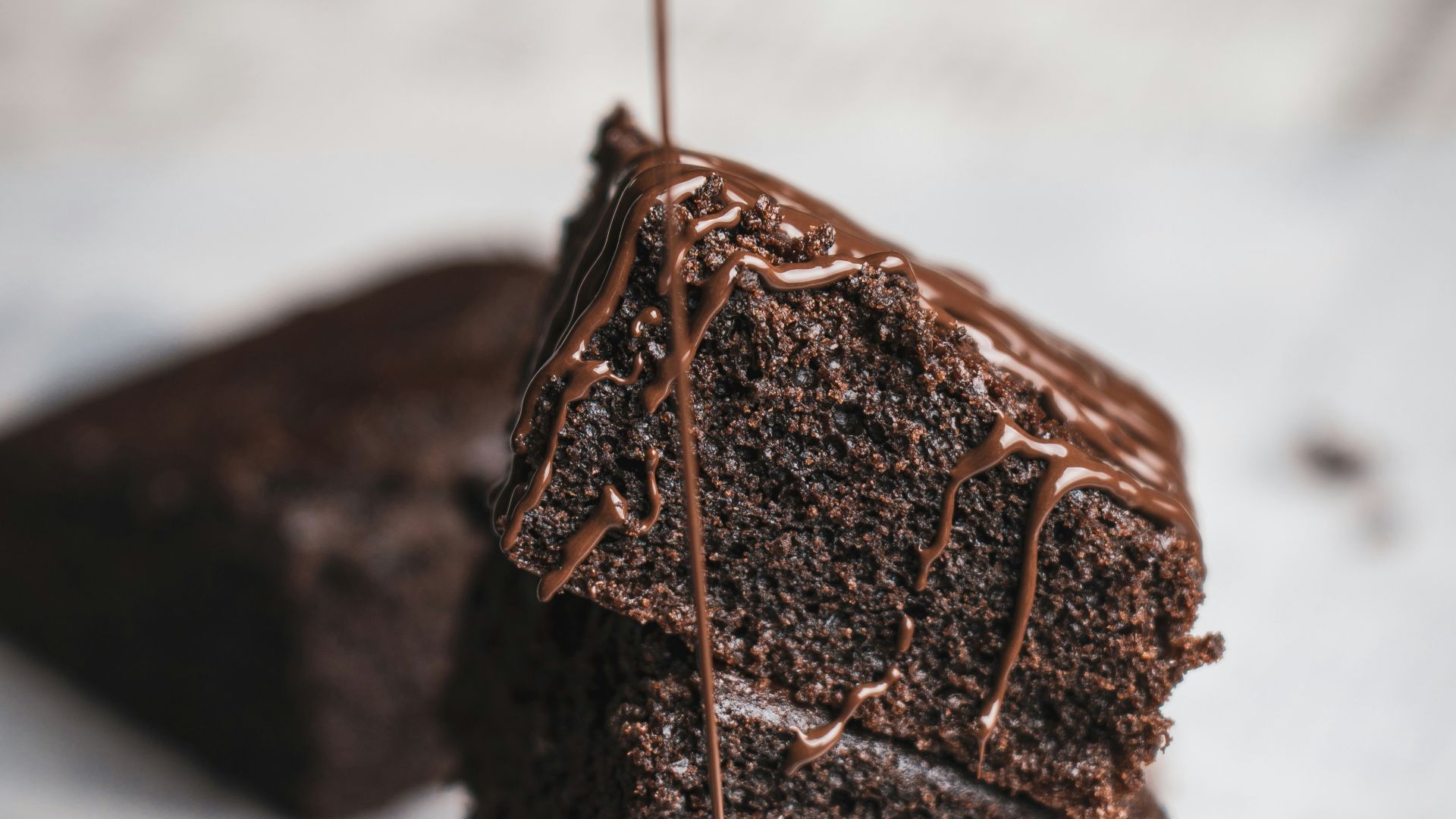 chocolate cake on white ceramic plate
