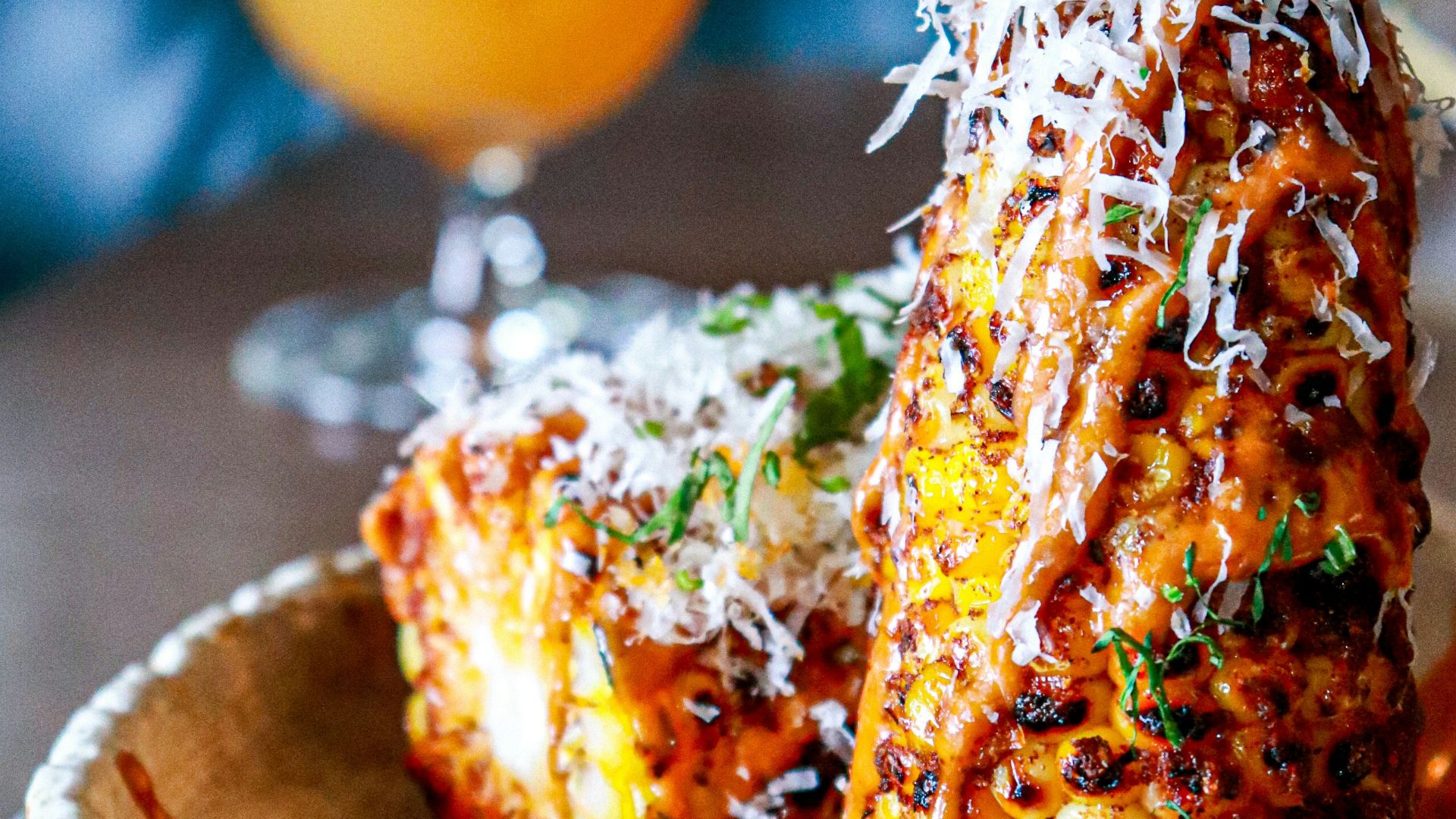 orange and white ice cream on white ceramic plate