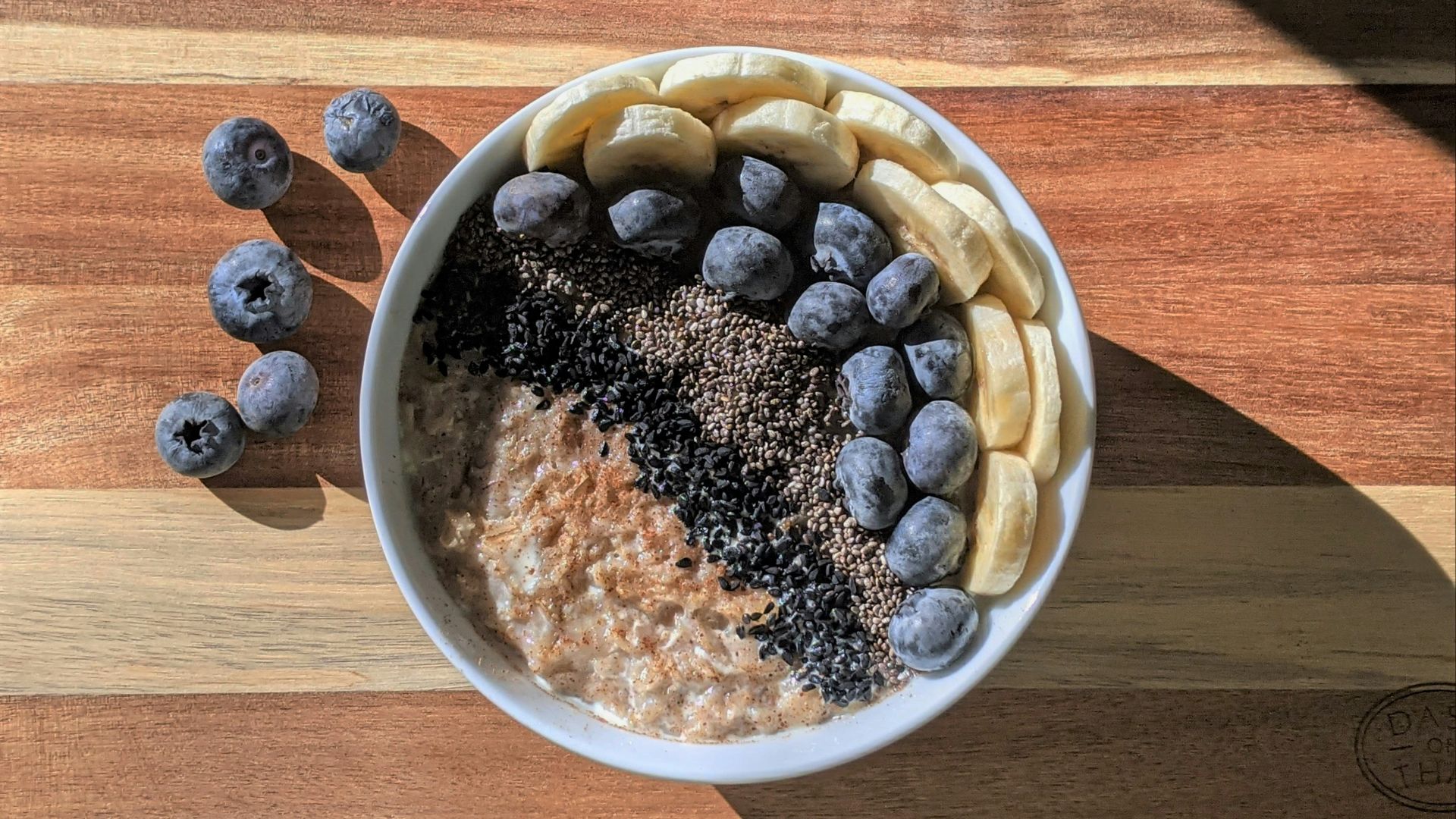 brown and black beans in white ceramic bowl