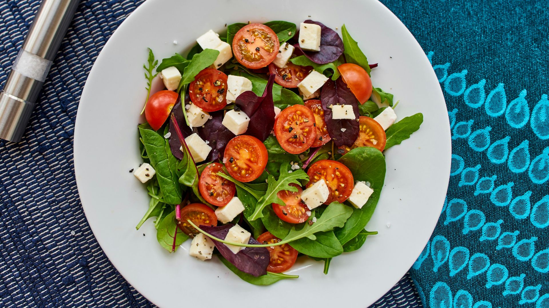 vegetable salad on round white ceramic plate