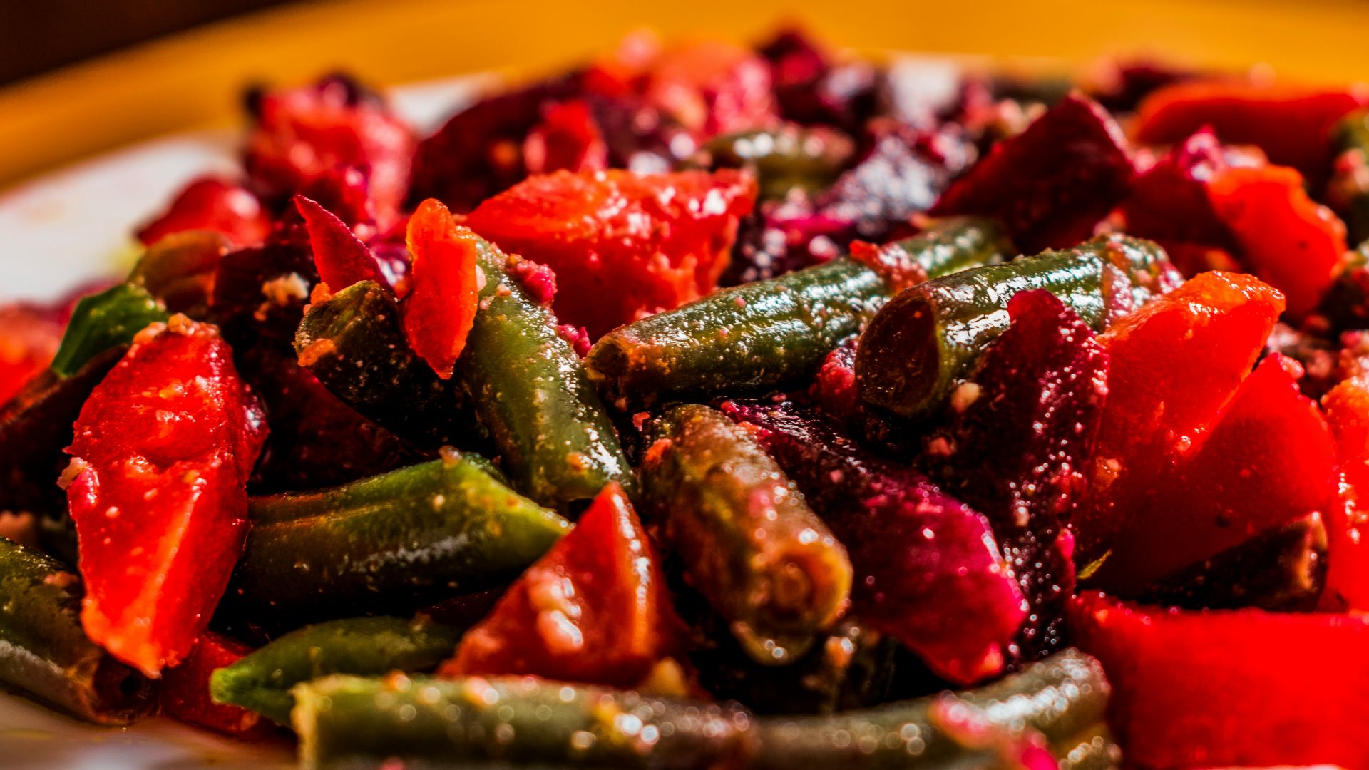 a white plate topped with sliced up vegetables