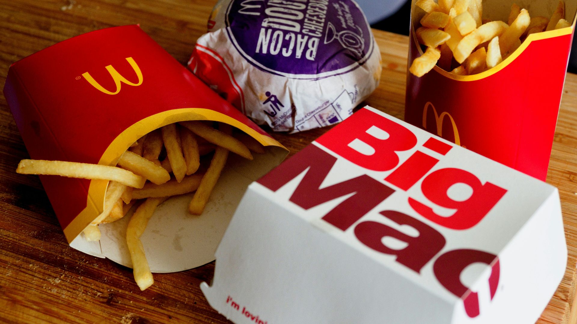 a sandwich sitting on top of a wooden table