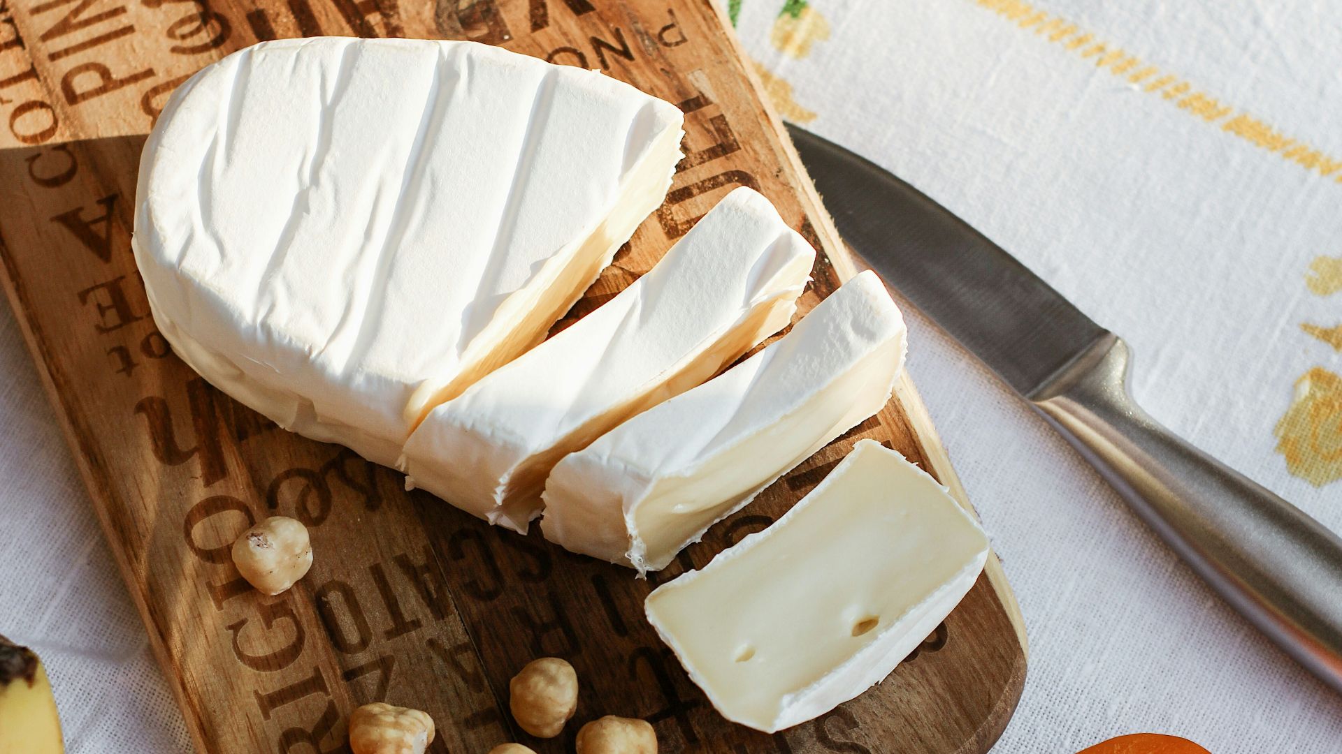 sliced bread on brown wooden chopping board