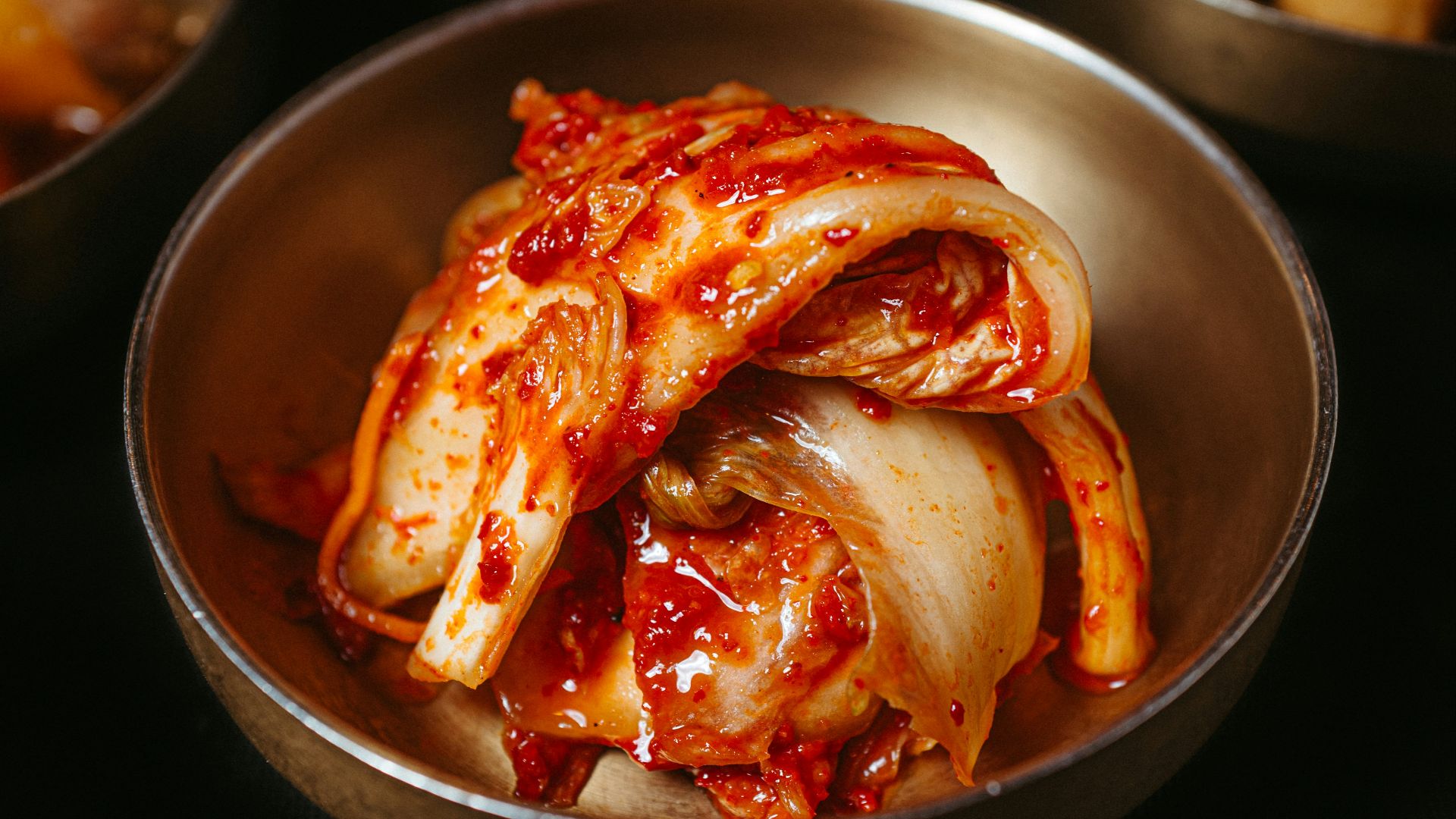 a table topped with bowls filled with food