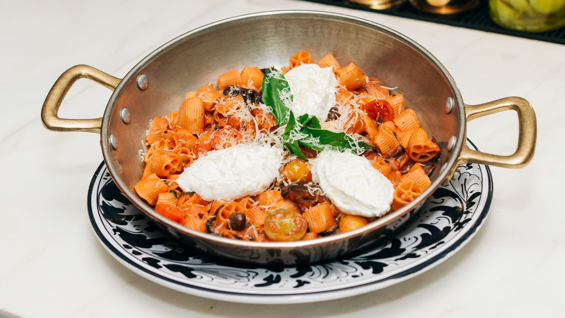 A bowl of food sitting on top of a counter