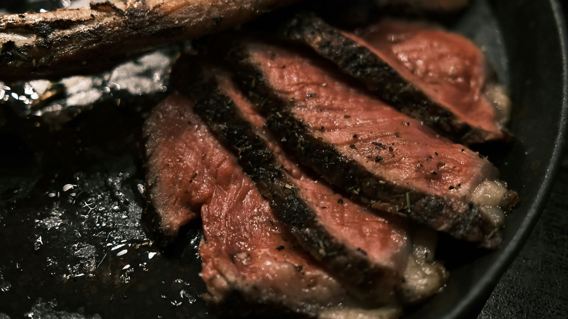 a close up of a plate of food with meat