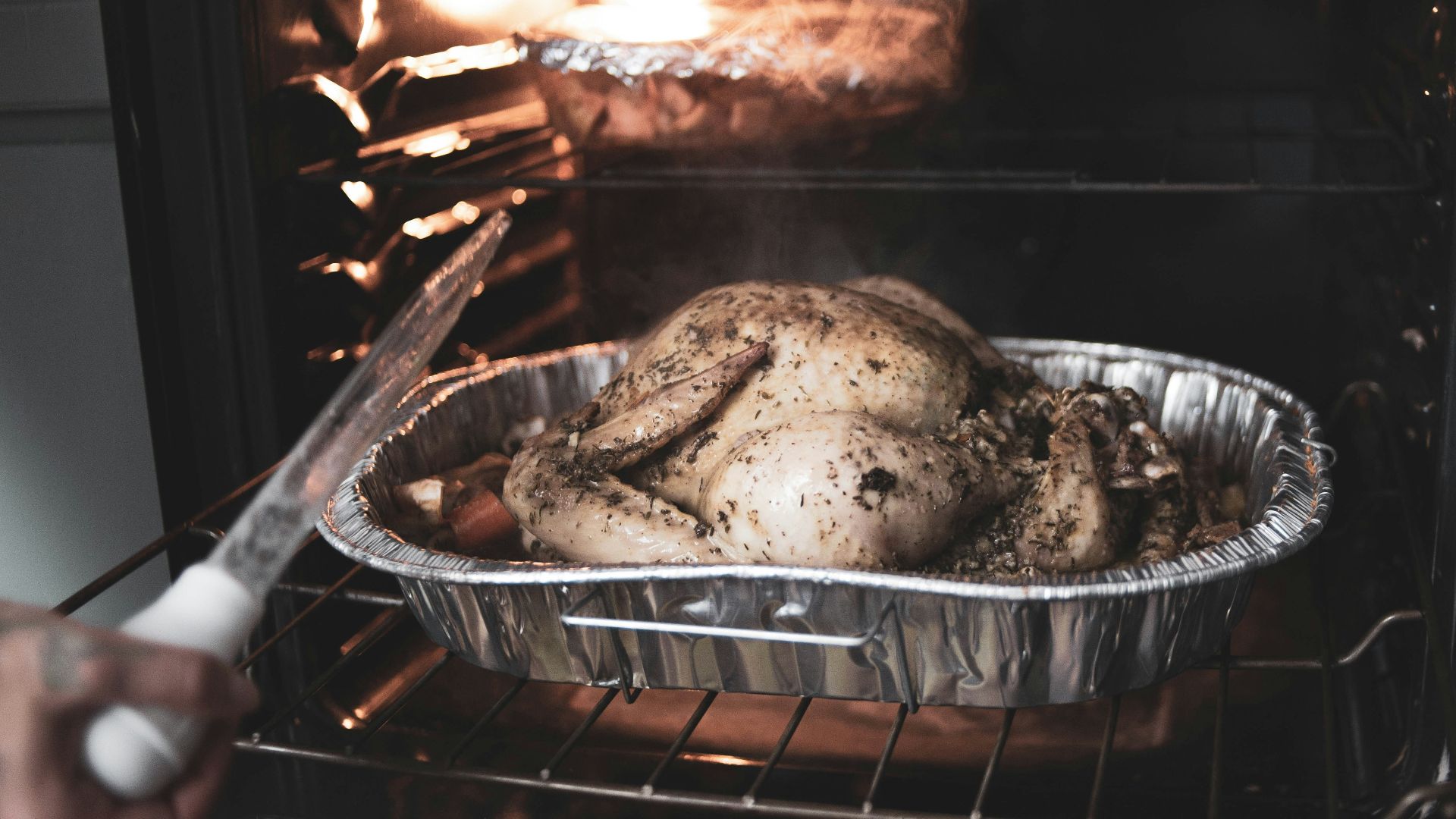 roasted chicken on black metal grill