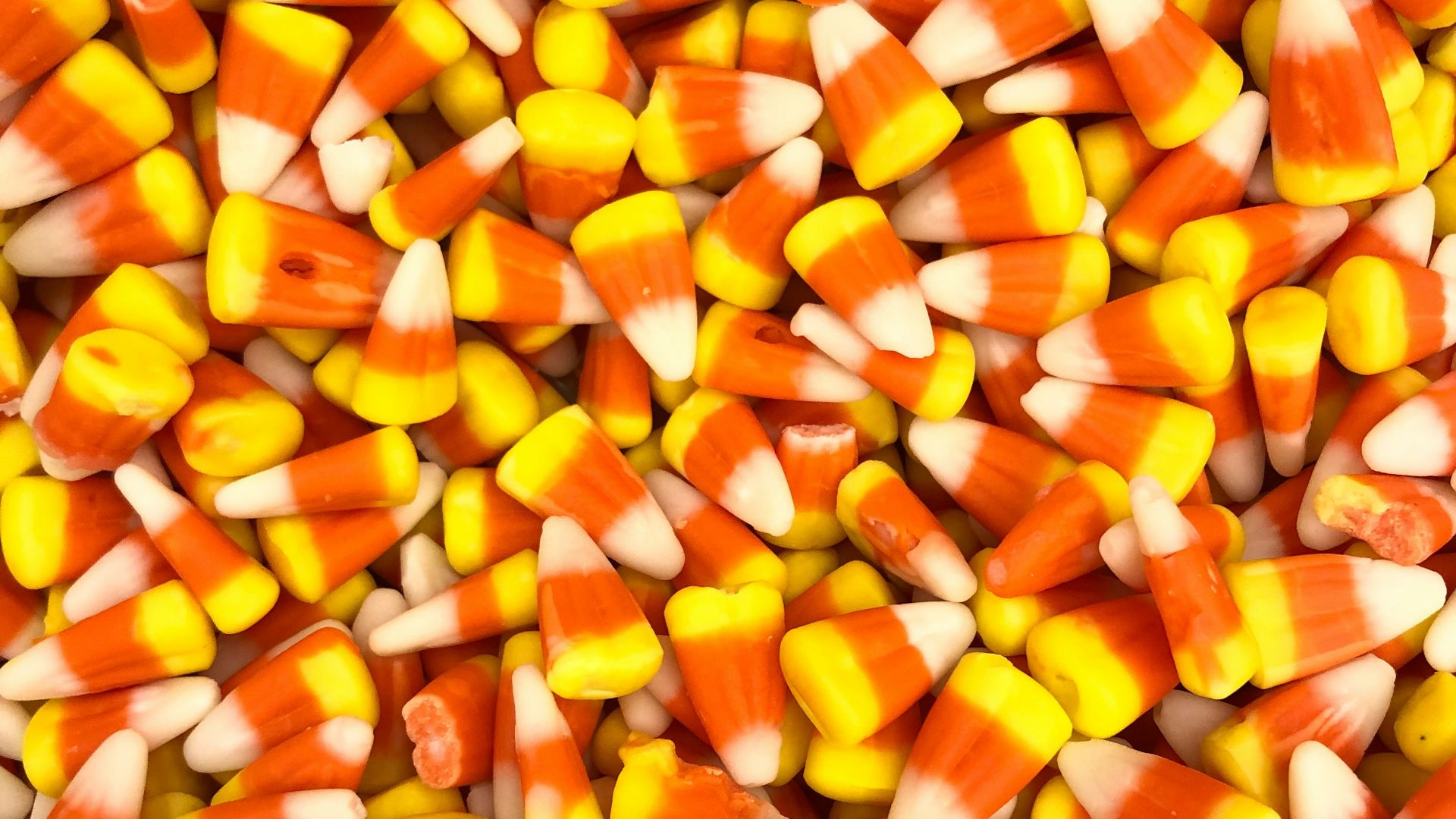 a large pile of candy corn is shown