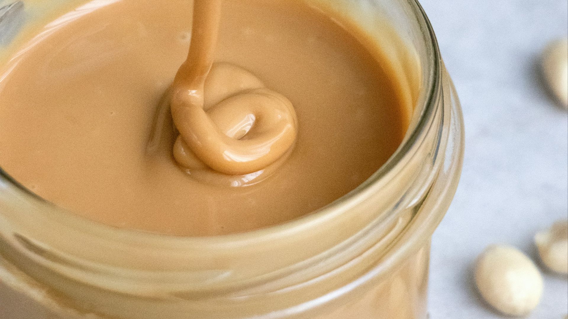 clear glass jar with brown liquid