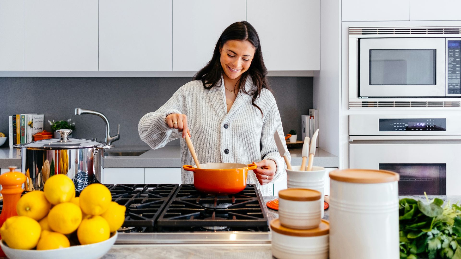 woman cooking inside kitchen room